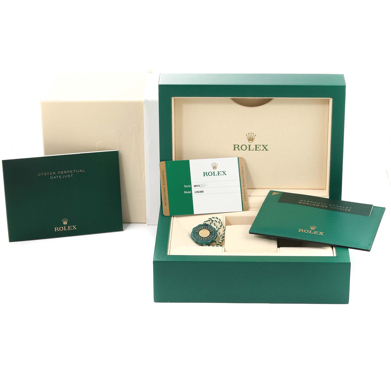 The image shows the packaging and accessories of the Rolex Datejust 41 126300 Men
s Stainless Steel Black Dial 126300 Men
s Stainless Steel Black Dial, including its box, warranty card, and manual.