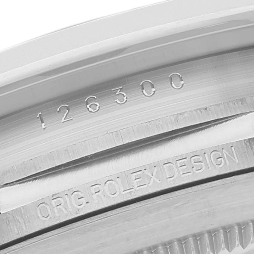 This image shows the engraved case details on a Rolex Datejust 41 126300 Men
s Stainless Steel Black Dial 126300 Men
s Stainless Steel Black Dial model from a close-up angle.