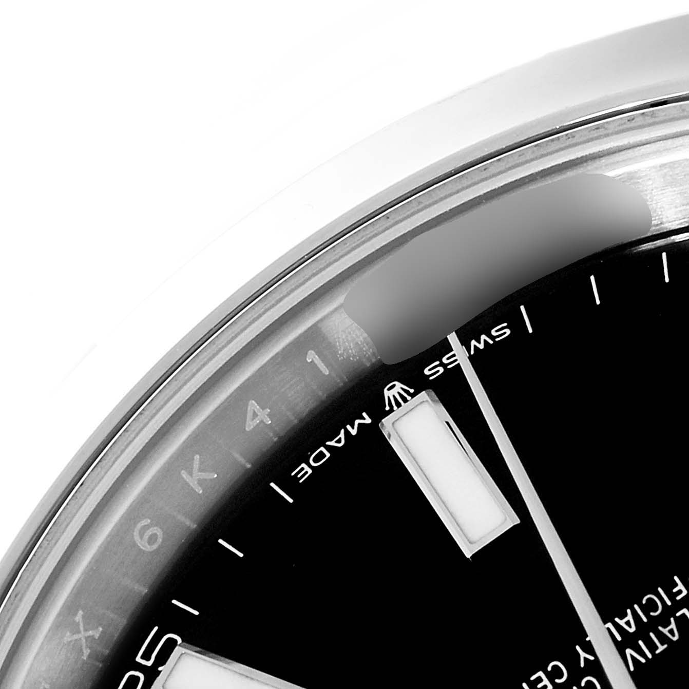 This image shows a close-up of the bezel, dial, and part of the crystal of a Rolex Datejust 41 126300 Men
s Stainless Steel Black Dial 126300 Men
s Stainless Steel Black Dial watch.