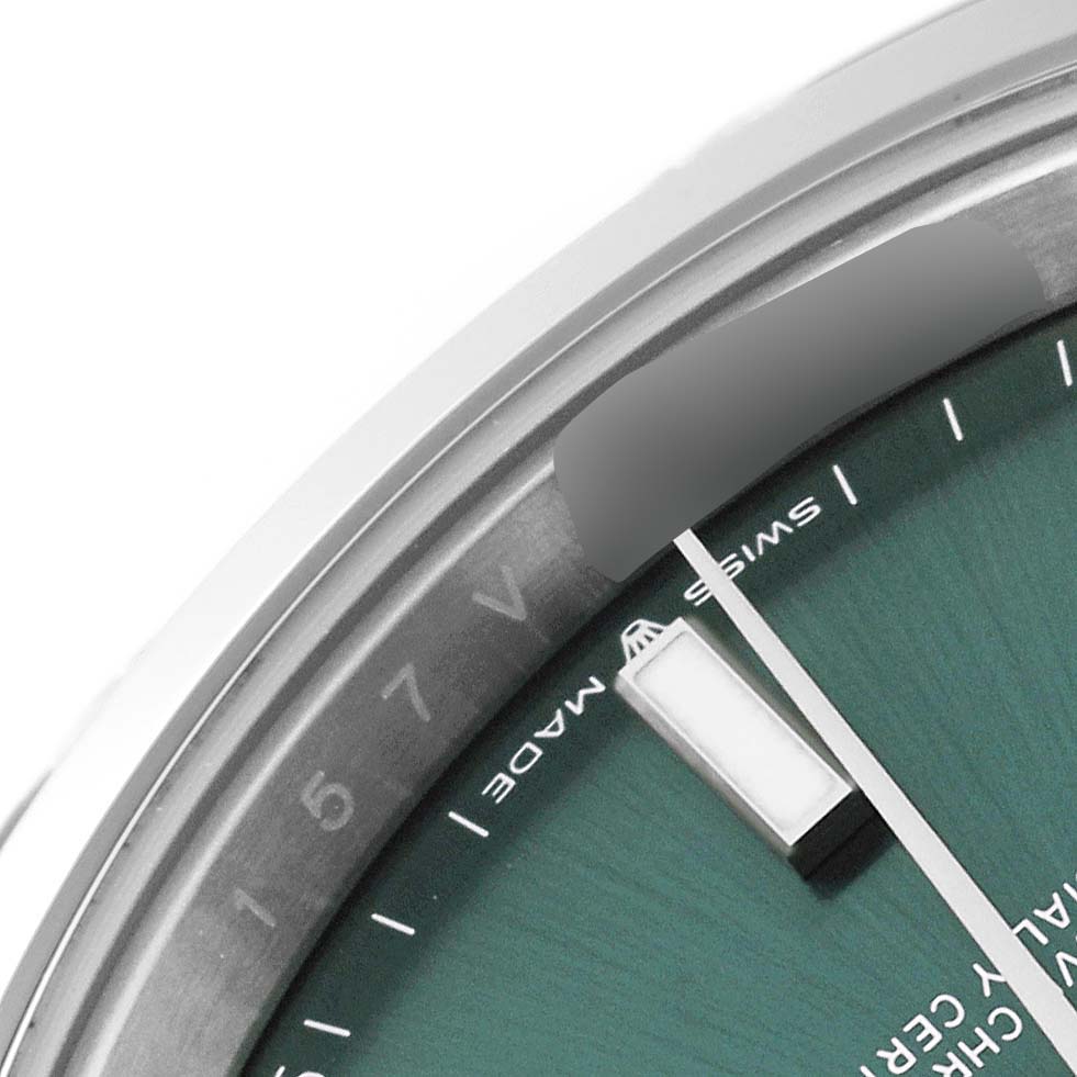 This image shows a close-up of the dial and bezel of the Rolex Datejust 41 126300 Men's Stainless Steel Green Dial 126300 Men's Stainless Steel Green Dial watch.