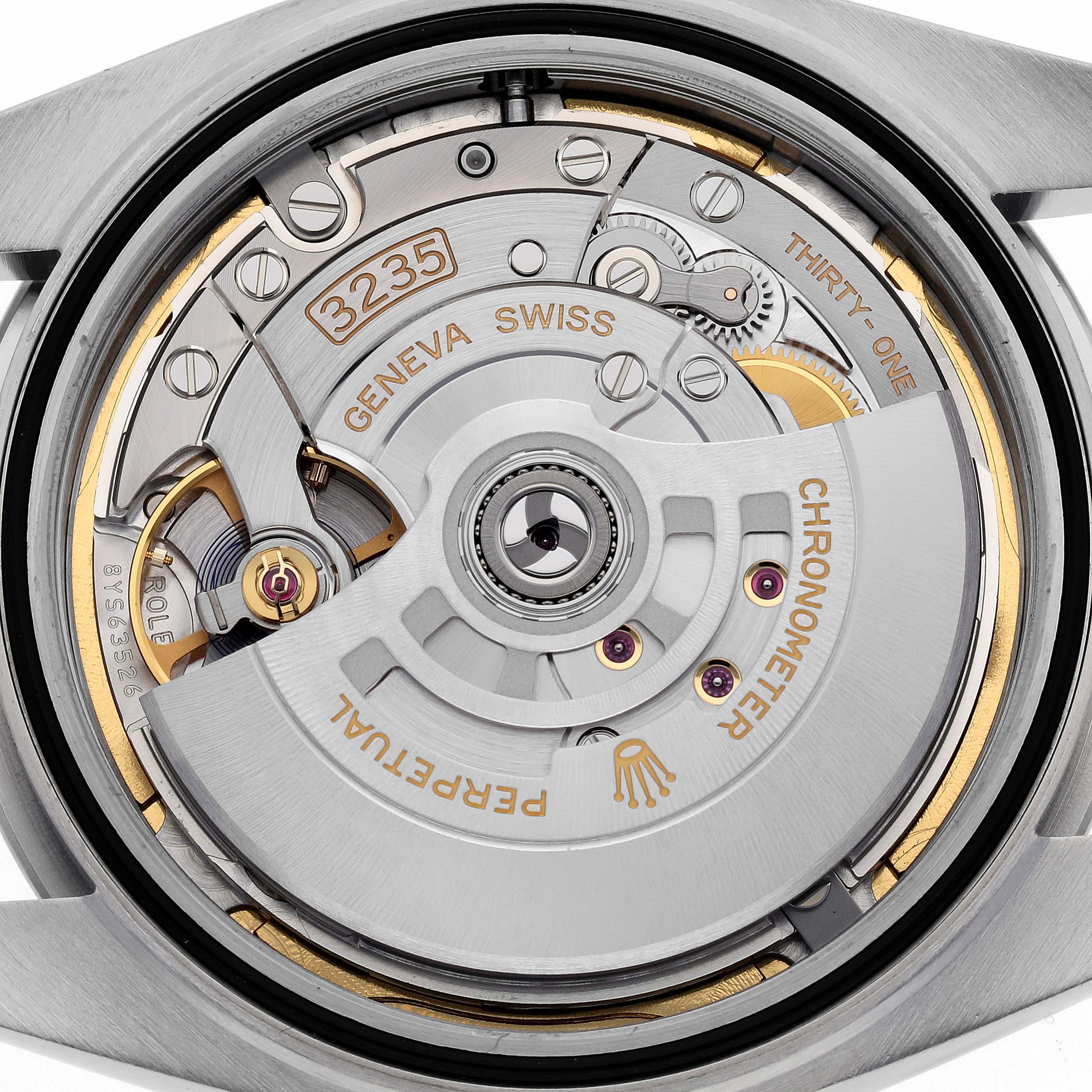 This image shows the movement mechanism and internal components of the Rolex Datejust 41 126300 Men's Stainless Steel Green Dial 126300 Men's Stainless Steel Green Dial watch from a rear perspective.
