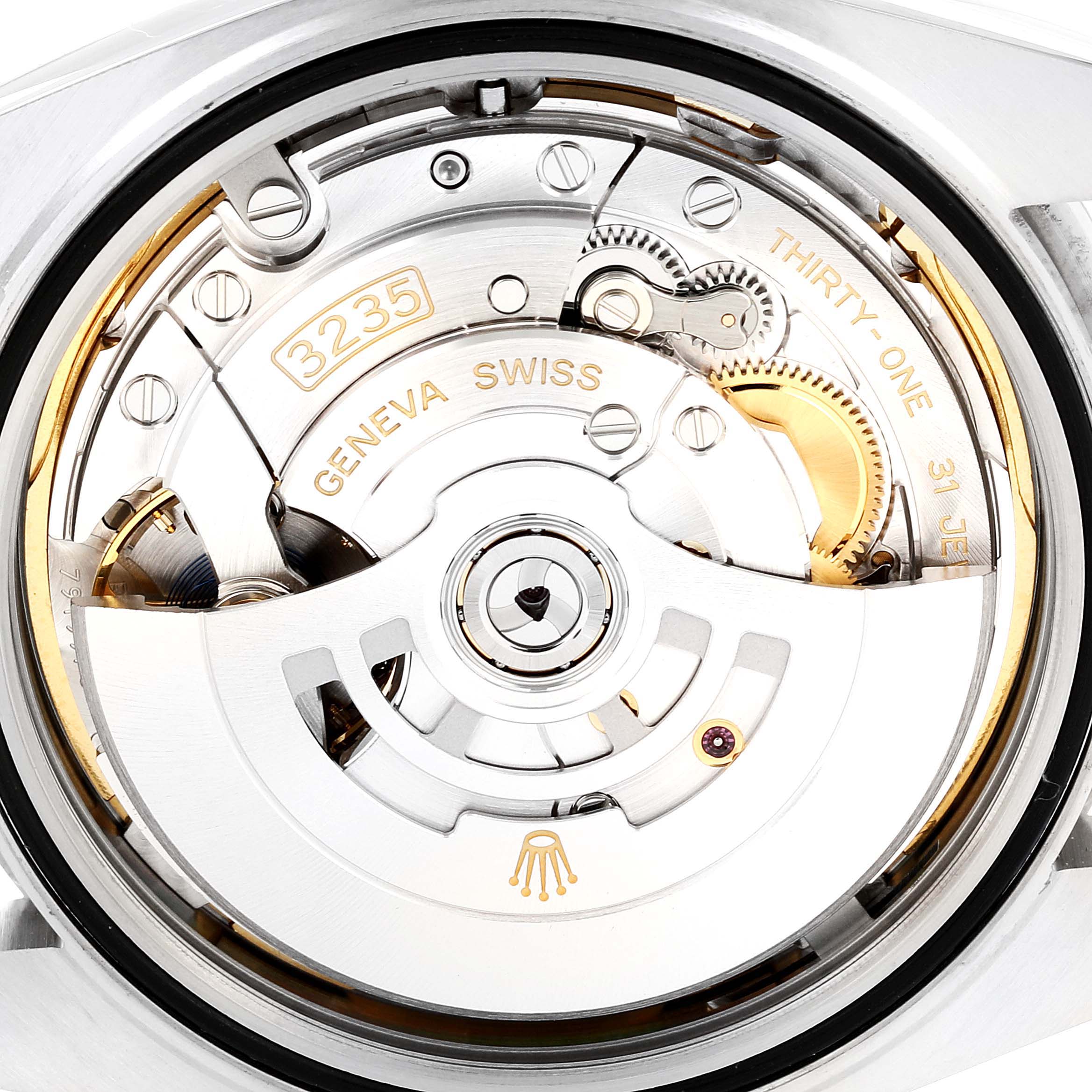The image shows the movement of the Rolex Datejust 41, model 126300, featuring intricate components like gears and the rotor, viewed from the back.