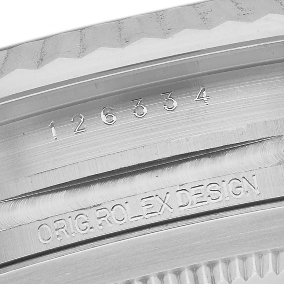 This image shows a close-up angle of the case side and bezel of a Rolex Datejust 41 126334 Men
s Stainless Steel Grey Dial 126334 Men
s Stainless Steel Grey Dial, featuring engraving details and the model number.