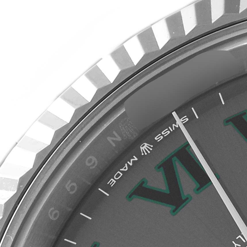 The image shows the detailed edge of the bezel and part of the dial with markings on a Rolex Datejust 41 126334 Men
s Stainless Steel Grey Dial 126334 Men
s Stainless Steel Grey Dial watch.