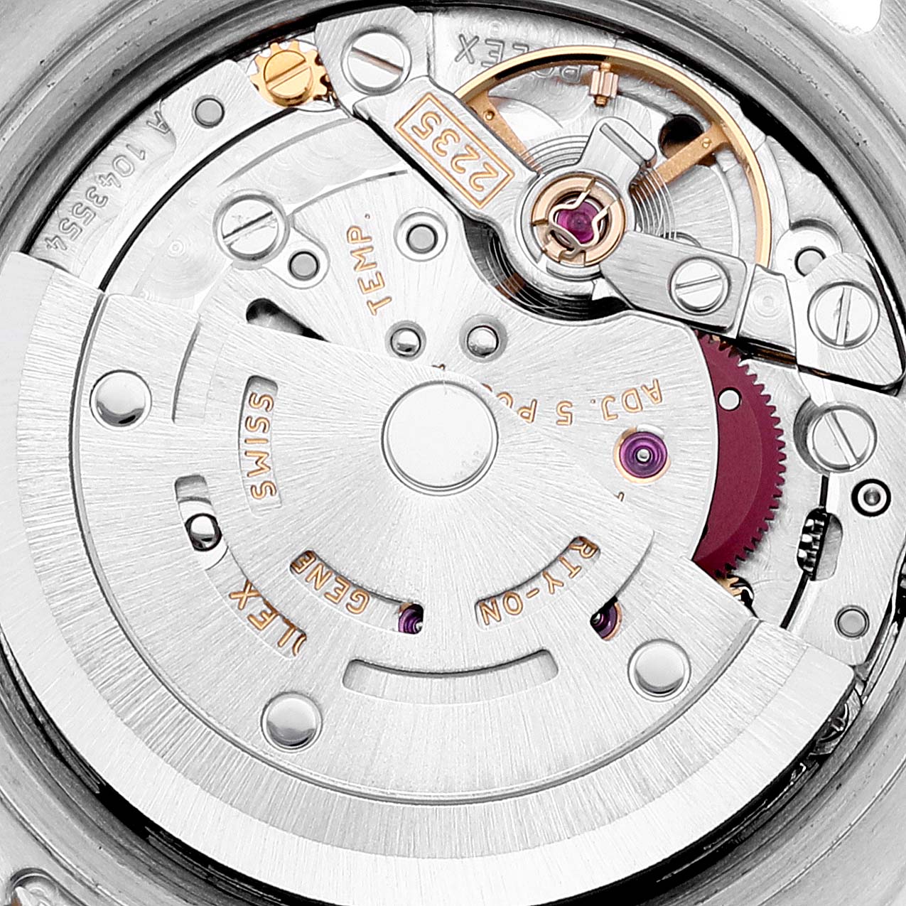 This image shows a close-up view of the Rolex Datejust 179173 Women's Steel and Gold (two tone) Black Dial 179173 Women's Steel and Gold (two tone) Black Dial movement and internal mechanics.