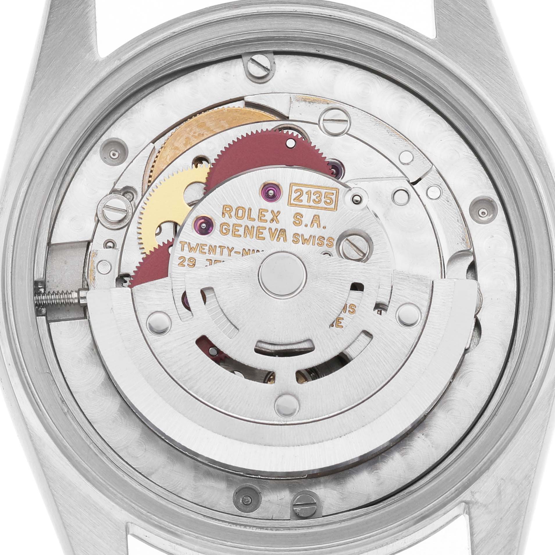 The image shows the movement of a Rolex Mid-Size 68273 Women's Steel and Gold (two tone) Champagne Dial watch from a back angle, highlighting gears and the rotor.
