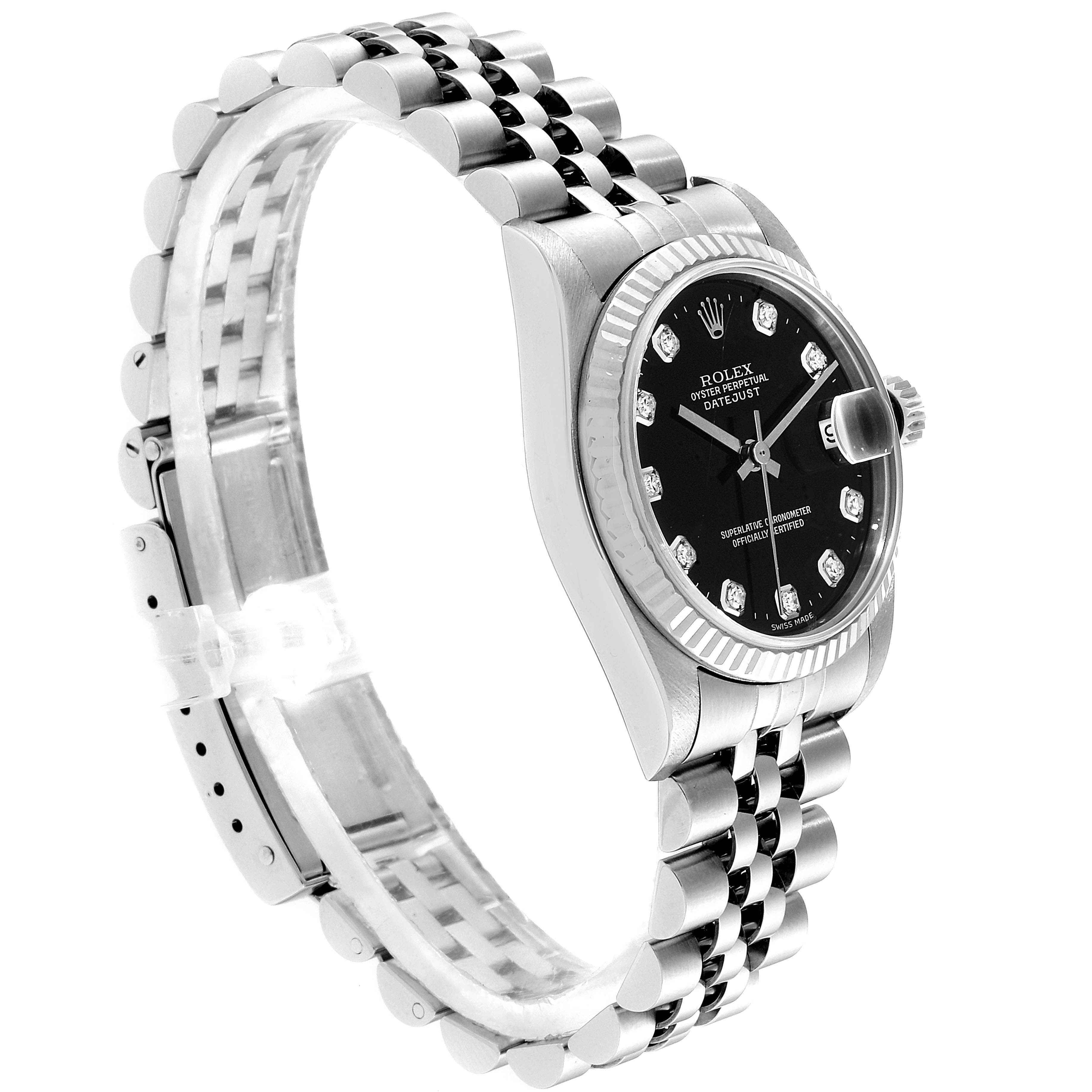 This image shows a Rolex Mid-Size 78274 Women
s Stainless Steel Black Dial 78274 Women
s Stainless Steel Black Dial Datejust watch at a side angle, highlighting its bezel, black dial, and jubilee bracelet.