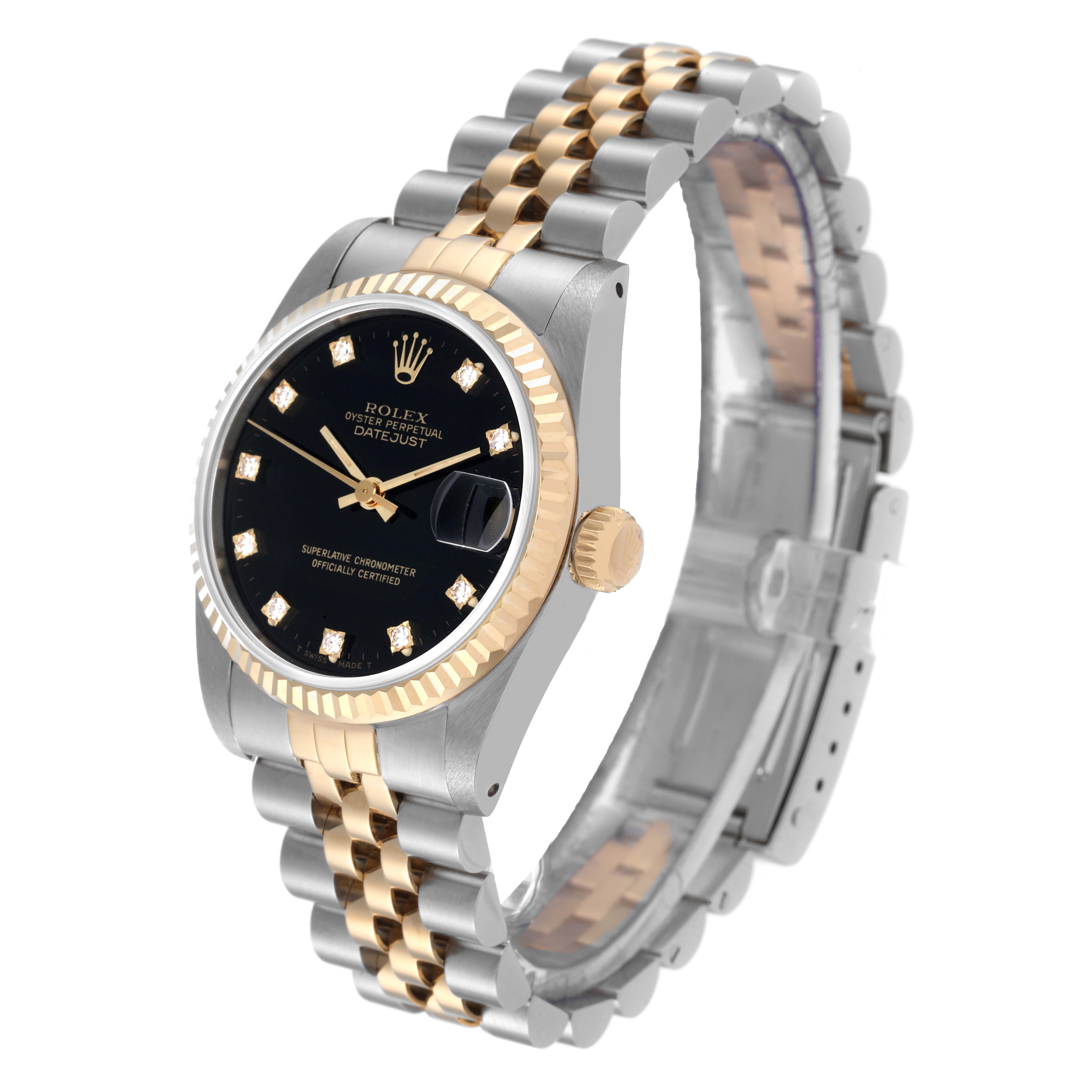 The image showcases a Rolex Mid-Size 68273 Women's Steel and Gold (two tone) Black Dial 68273 Women's Steel and Gold (two tone) Black Dial Datejust watch from an angled side and top view, featuring the dial, bezel, and bracelet.