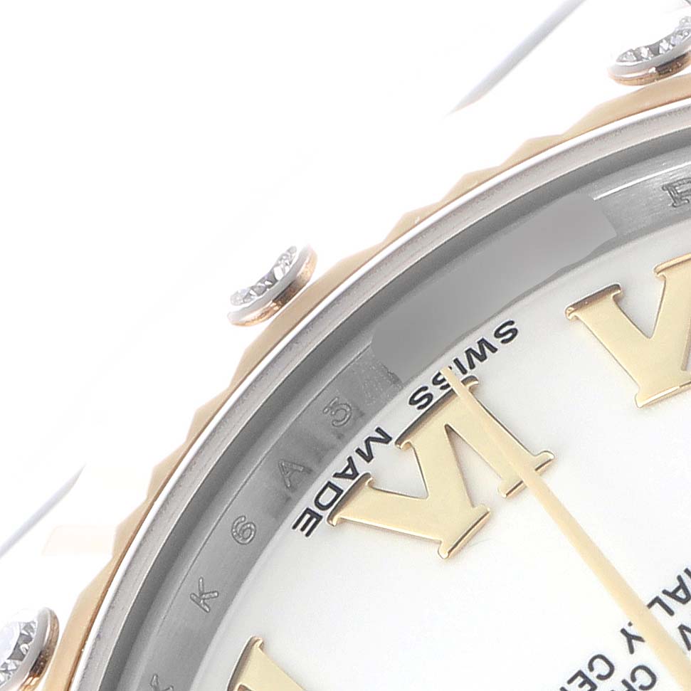 The image shows a partial close-up of the dial and bezel details of the Rolex Mid-Size Men
s watch, model number 178313, highlighting the Roman numerals and diamond accents.