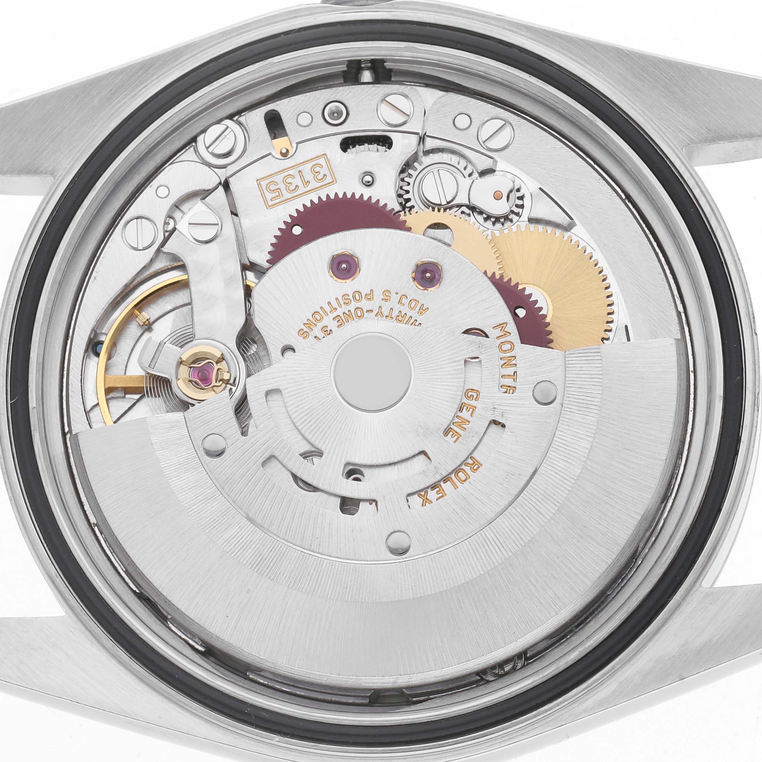 The image shows the movement mechanism of a Rolex Datejust model 16220 watch from a rear angle, highlighting its intricate gears and components.