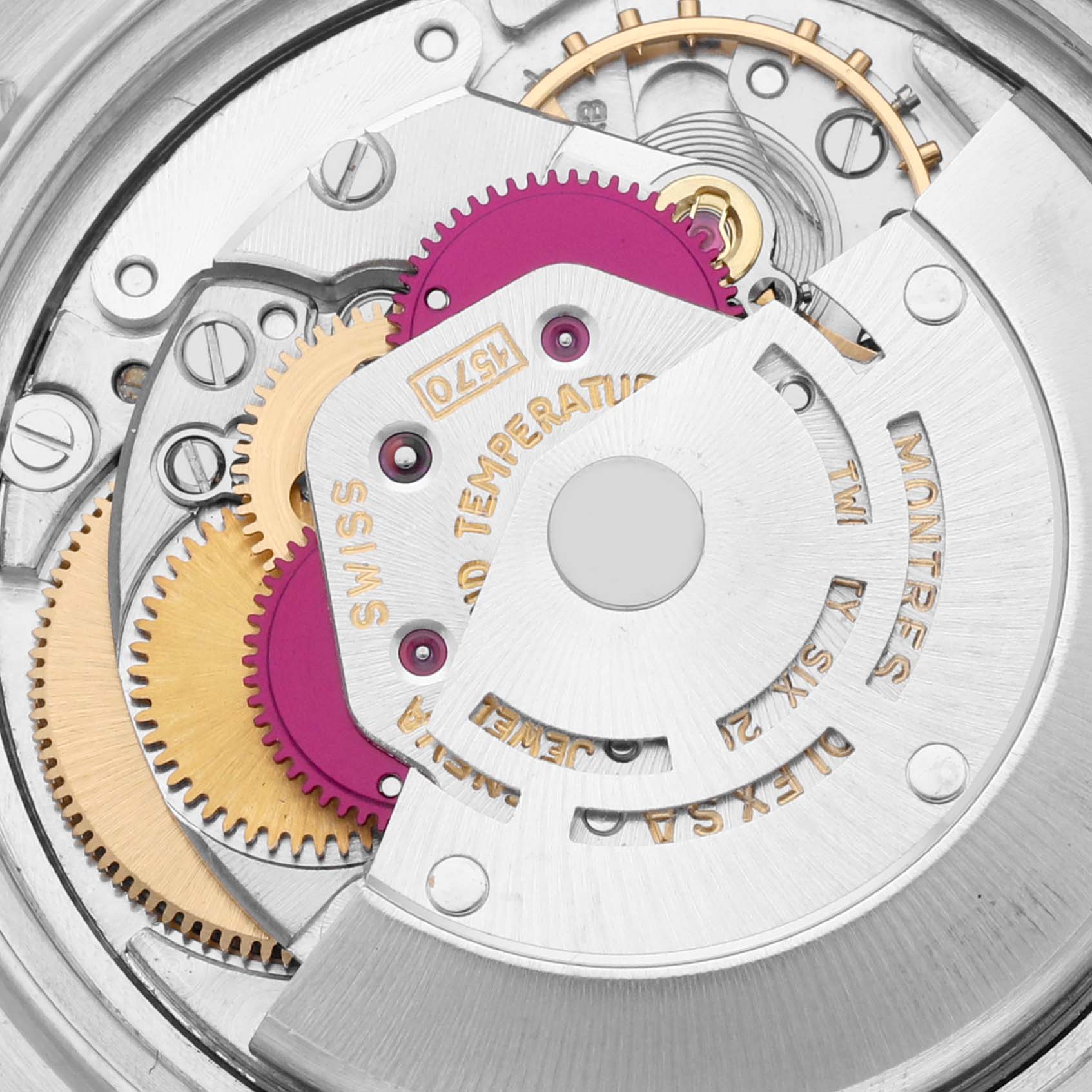 This image shows a close-up of the intricate inner mechanics of a Rolex Vintage Collection 1603 Men's Stainless Steel Silver Dial 1603 Men's Stainless Steel Silver Dial watch movement.