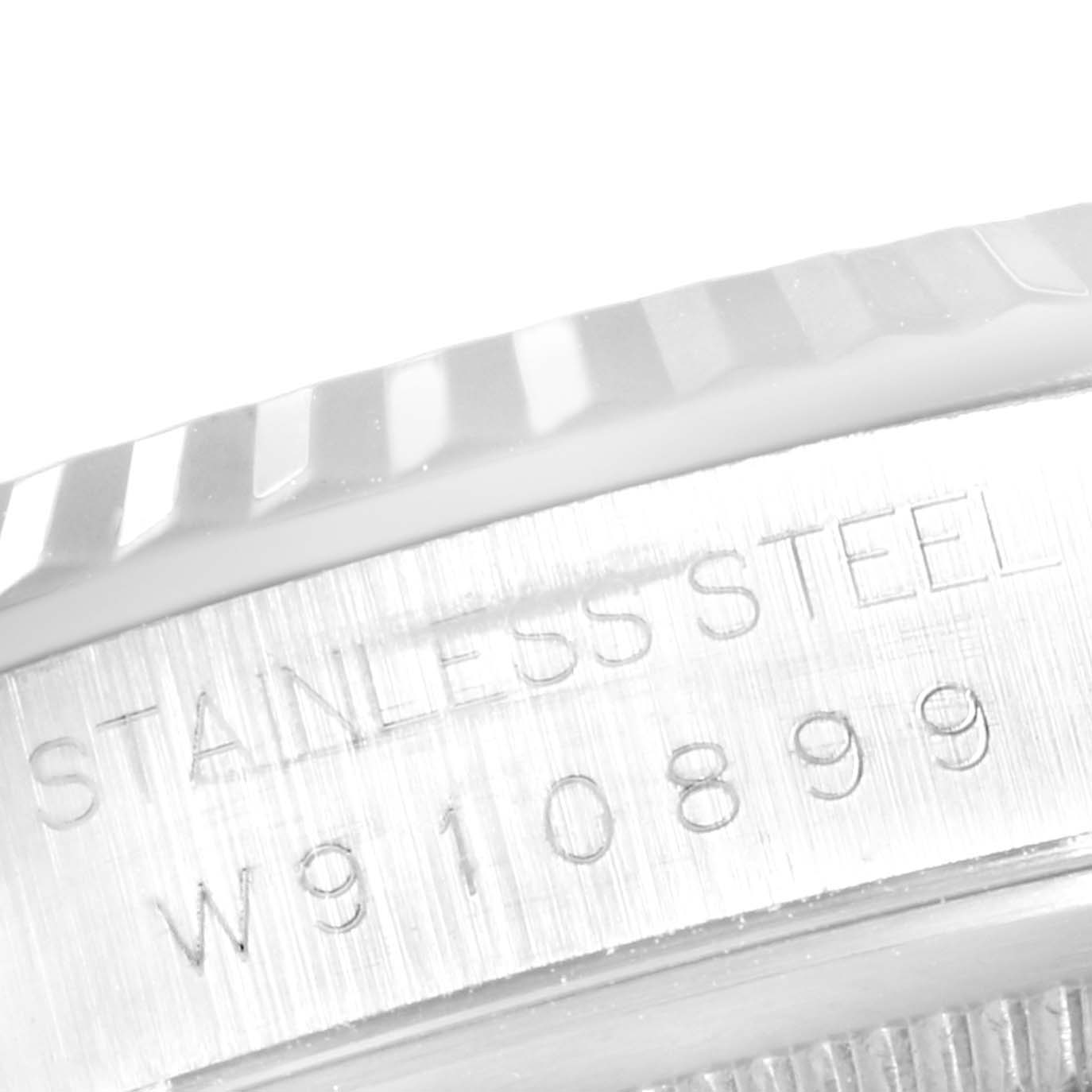 This close-up shot shows the serial number engraving on the side of the stainless steel case of the Rolex Datejust 16234 Men's Stainless Steel Silver Dial 16234 Men's Stainless Steel Silver Dial model.