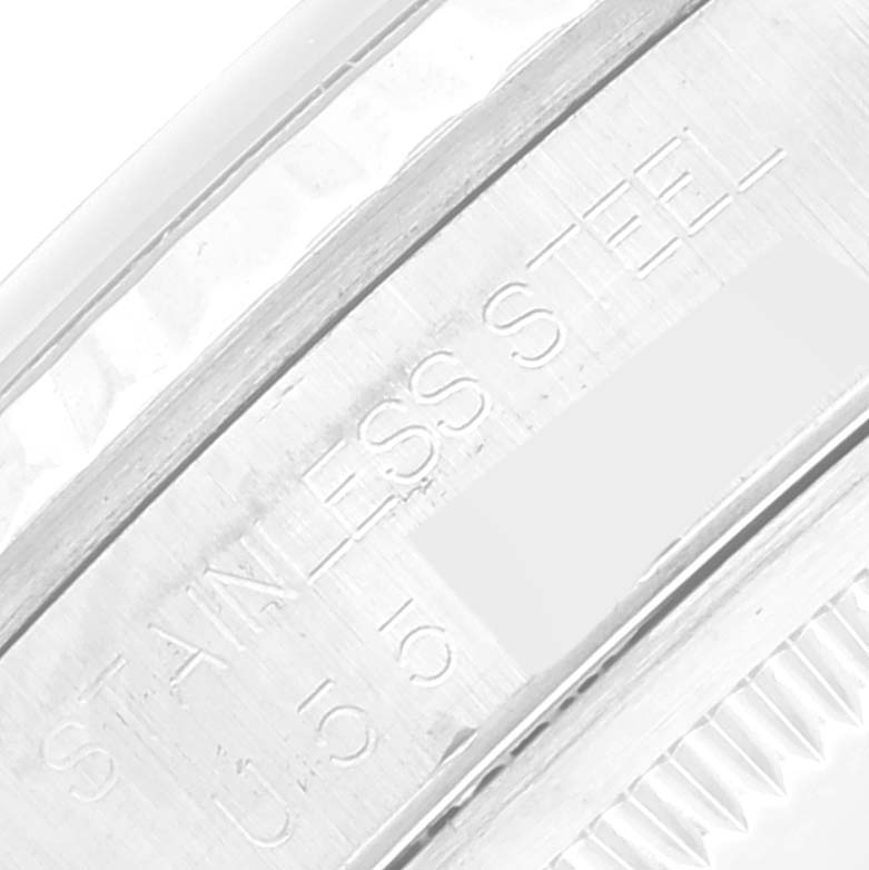 This close-up image shows the side view of the stainless steel case of a Rolex Datejust 16234 Men's Stainless Steel Silver Dial 16234 Men's Stainless Steel Silver Dial watch.