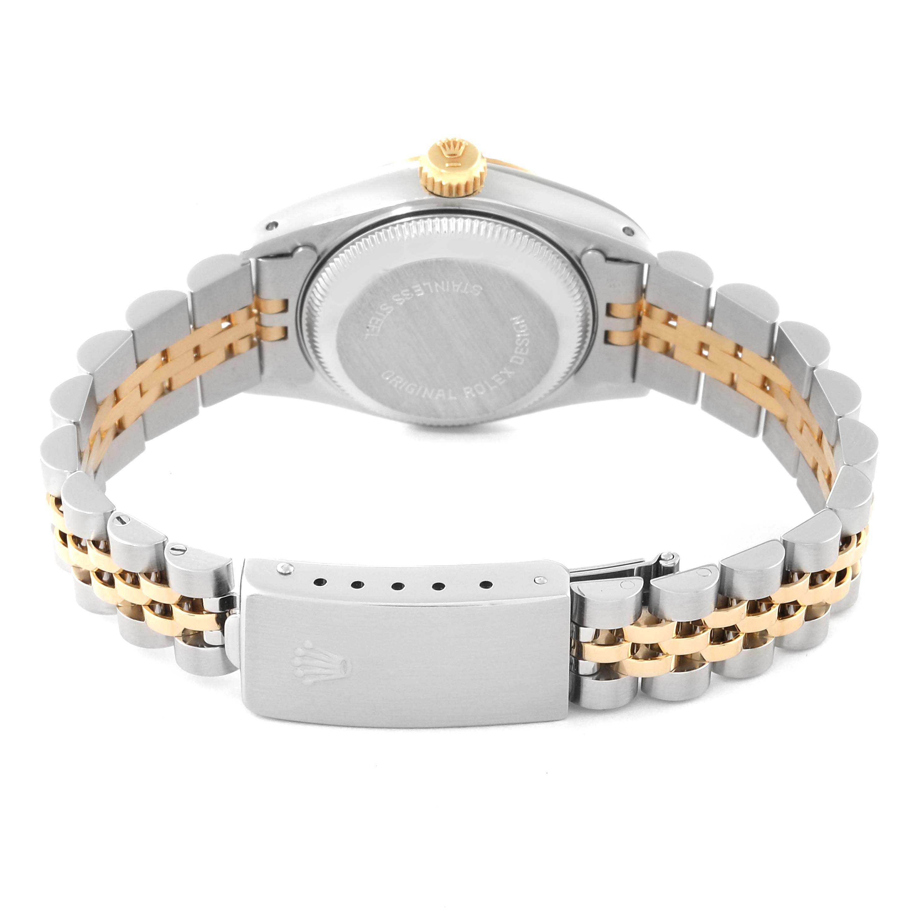 The image shows the back of a Rolex Datejust 69173G Women's Steel and Gold (two tone) Champagne Dial 69173G Women's Steel and Gold (two tone) Champagne Dial watch, including its stainless steel and gold bracelet and clasp.