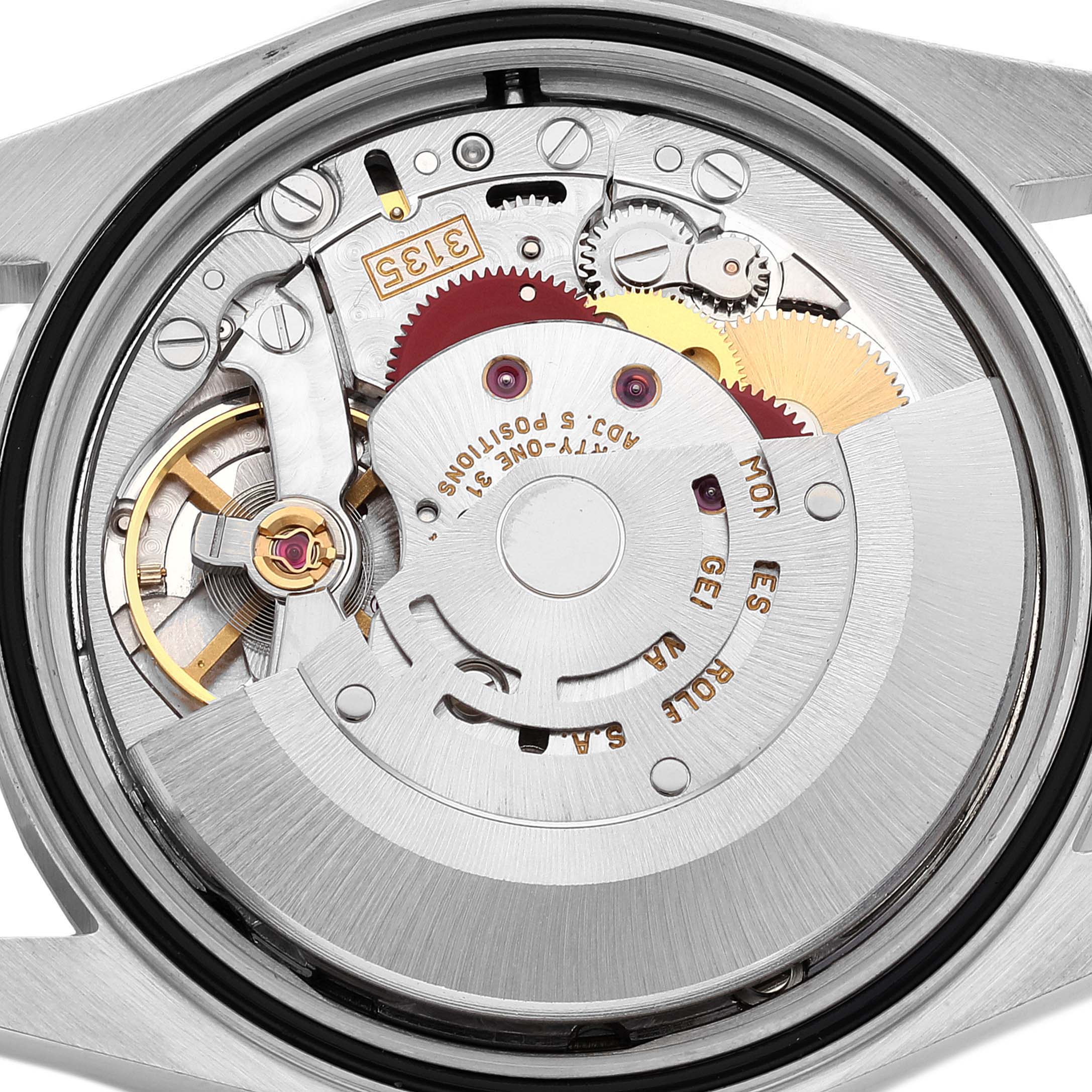 This image shows the backside of a Rolex Datejust 16233 Men's Steel and Gold (two tone) Champagne Dial 16233 Men's Steel and Gold (two tone) Champagne Dial watch, highlighting the intricate mechanics and inner movement components.