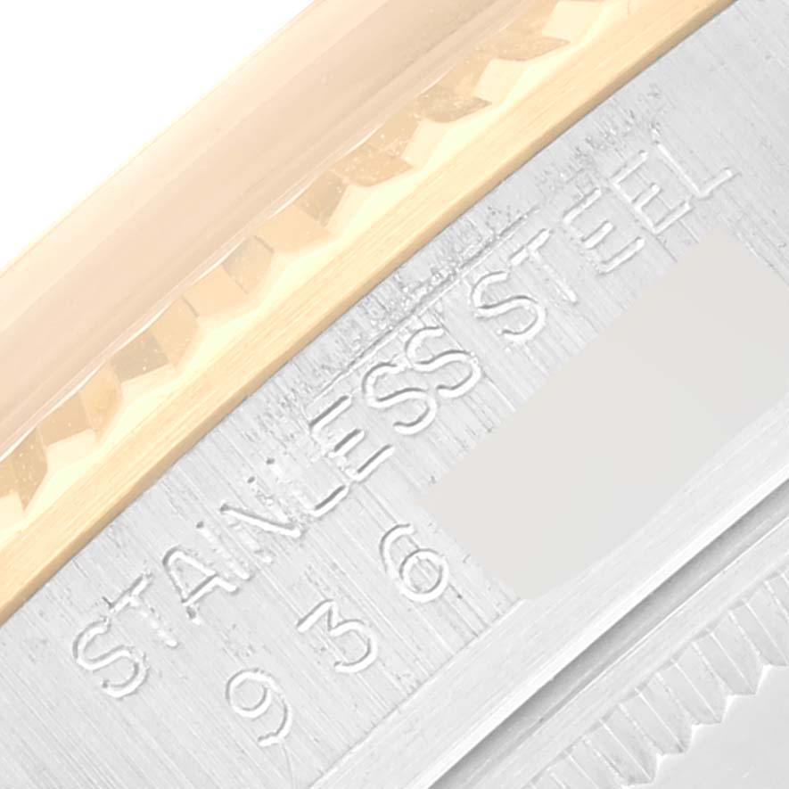 Close-up of the side of a Rolex Vintage Collection 16013 Men's Steel and Gold (two tone) Champagne Dial 16013 Men's Steel and Gold (two tone) Champagne Dial watch, highlighting the stainless steel and serial number.