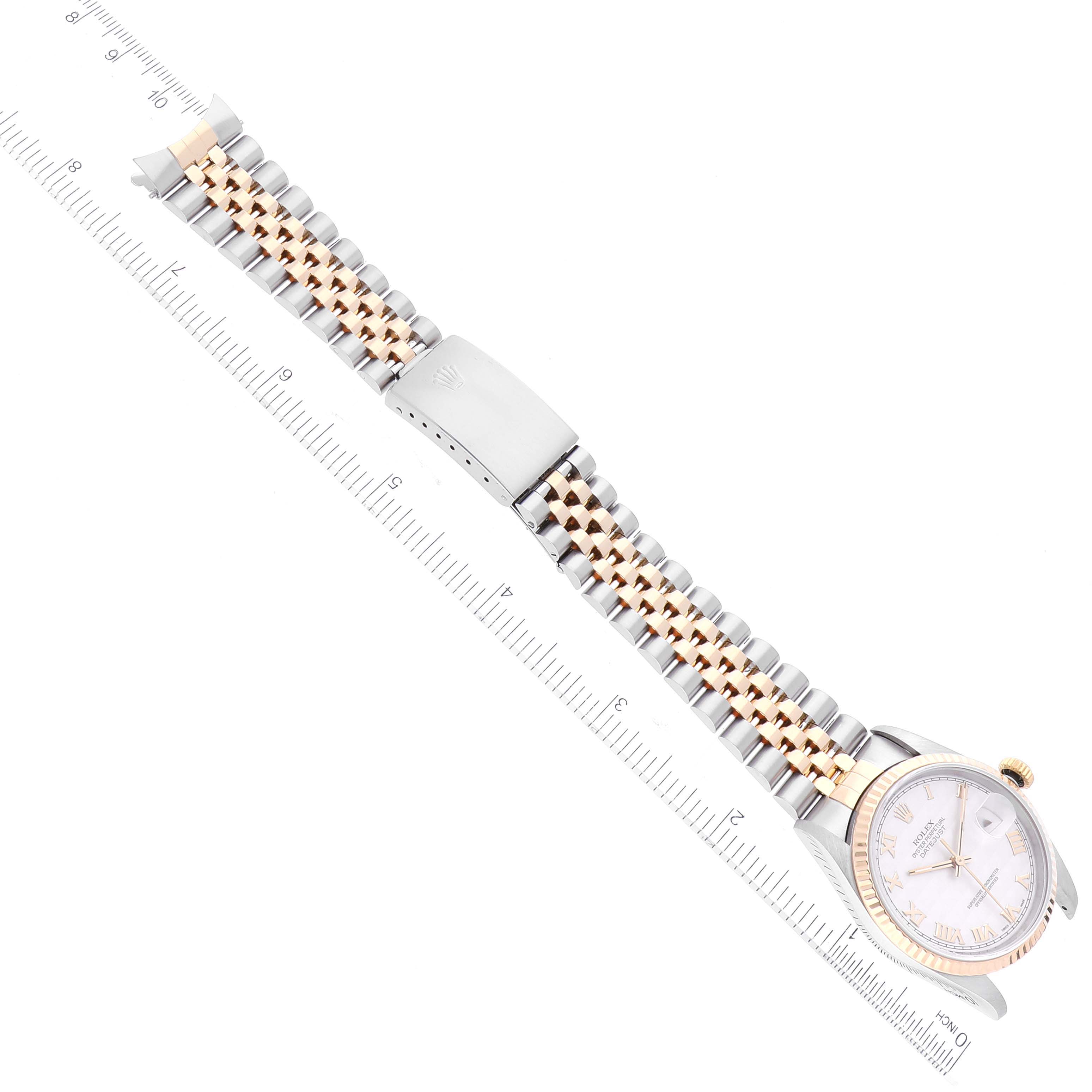 This image shows an overhead view of a Rolex Datejust 16233 Men's Steel and Gold (two tone) Beige Dial 16233 Men's Steel and Gold (two tone) Beige Dial watch, highlighting its face, bezel, and two-tone jubilee bracelet.