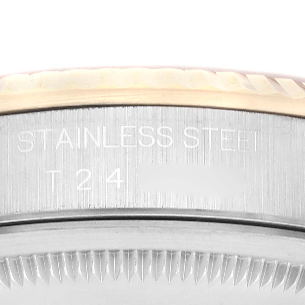The image shows a close-up of the stainless steel case side, bezel, and part of the edge of a Rolex Datejust 16233 Men's Steel and Gold (two tone) Silver Dial 16233 Men's Steel and Gold (two tone) Silver Dial watch.