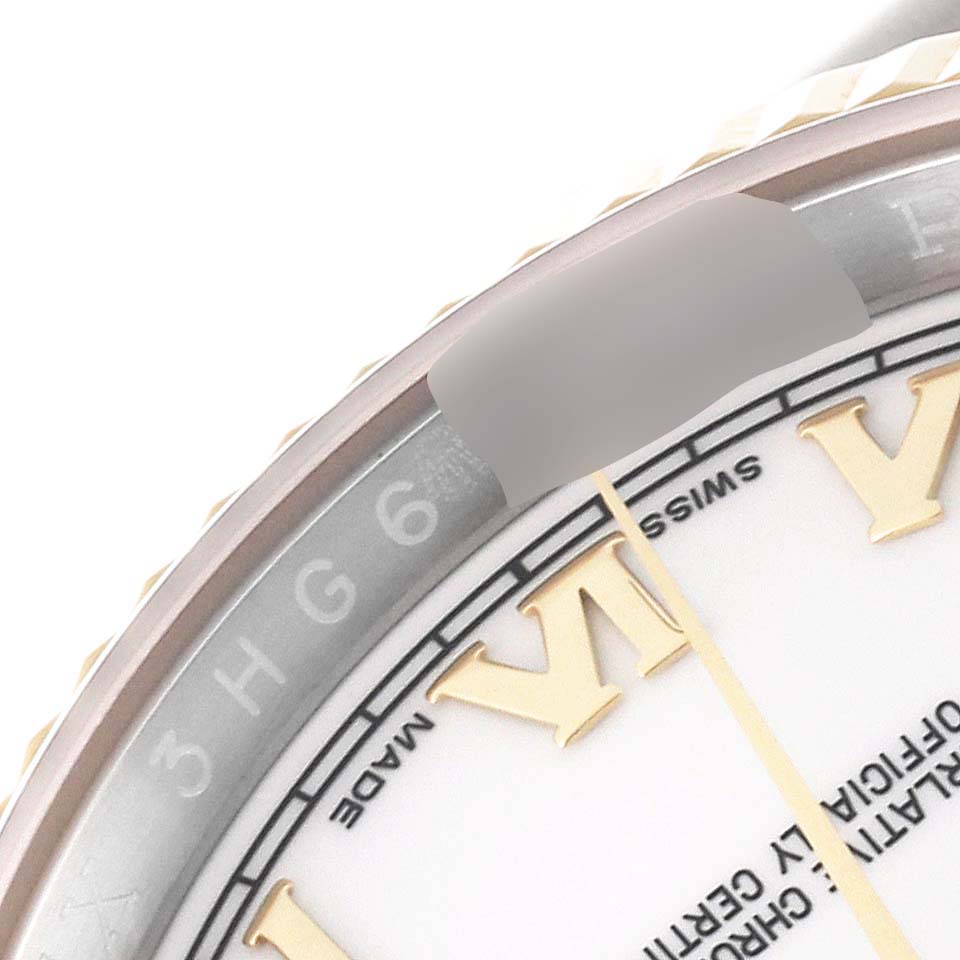 The image shows a close-up of the dial and bezel of a Rolex Datejust 116233 Men's Stainless Steel White Dial 116233 Men's Stainless Steel White Dial watch, highlighting Roman numerals and part of the watch's inner ring.