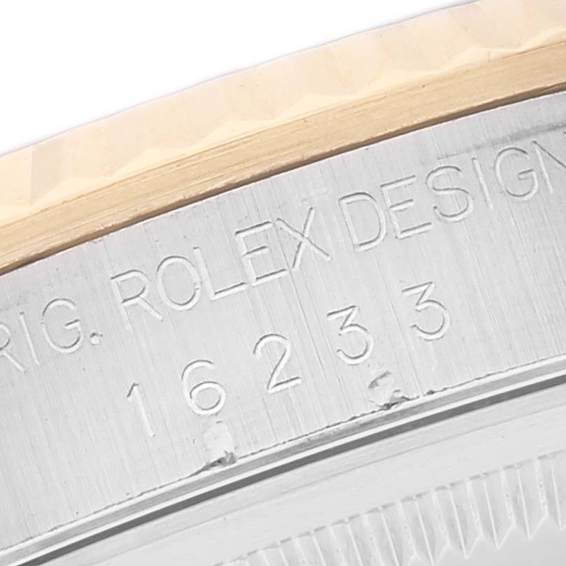 The image shows a close-up angle of the Rolex Datejust 16233 Men's Steel and Gold (two tone) White Dial 16233 Men's Steel and Gold (two tone) White Dial watch's case displaying the model number "16233."