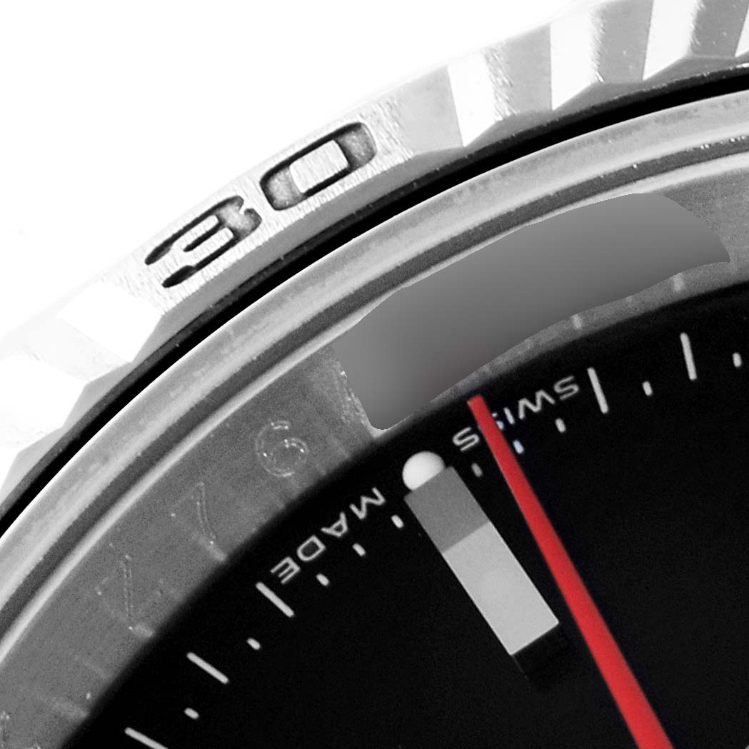 The image shows a close-up of the bezel and a portion of the dial of a Rolex Turn-o-Graph 116264 Men's Stainless Steel Black Dial 116264 Men's Stainless Steel Black Dial watch, highlighting the "30" marking and "Swiss Made" text.