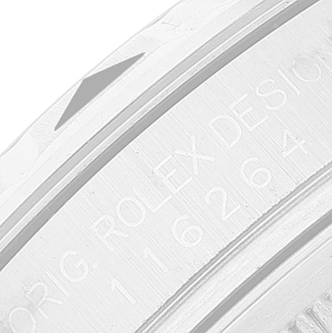 This close-up image shows the engraved details on the bezel of a Rolex Turn-o-Graph 116264 Men
s Stainless Steel Black Dial 116264 Men
s Stainless Steel Black Dial watch.