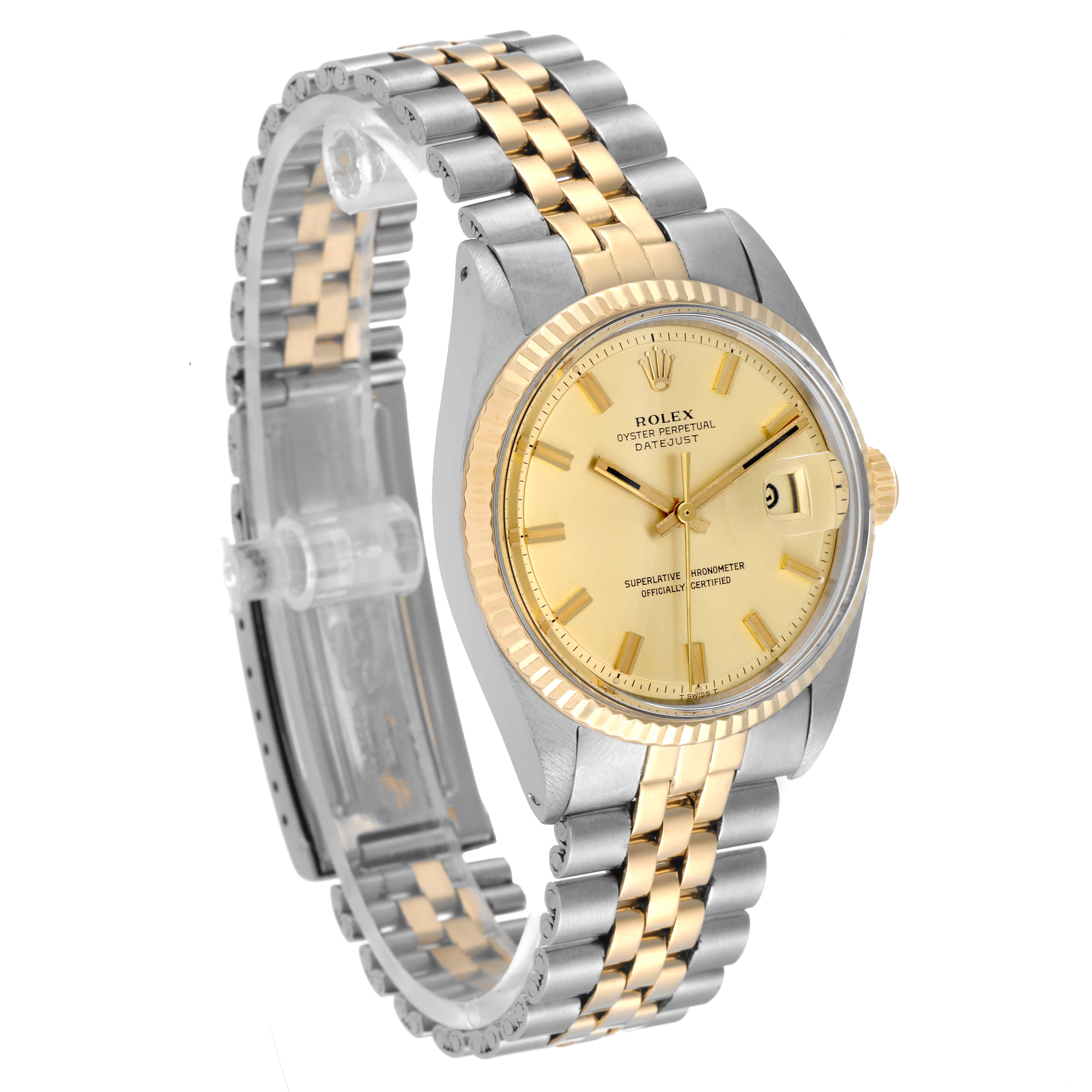 The image shows a front-side angled view of a Rolex Datejust 1601 Men
s Steel and Gold (two tone) Champagne Dial 1601 Men
s Steel and Gold (two tone) Champagne Dial watch, highlighting its gold dial, bezel, and two-tone bracelet.