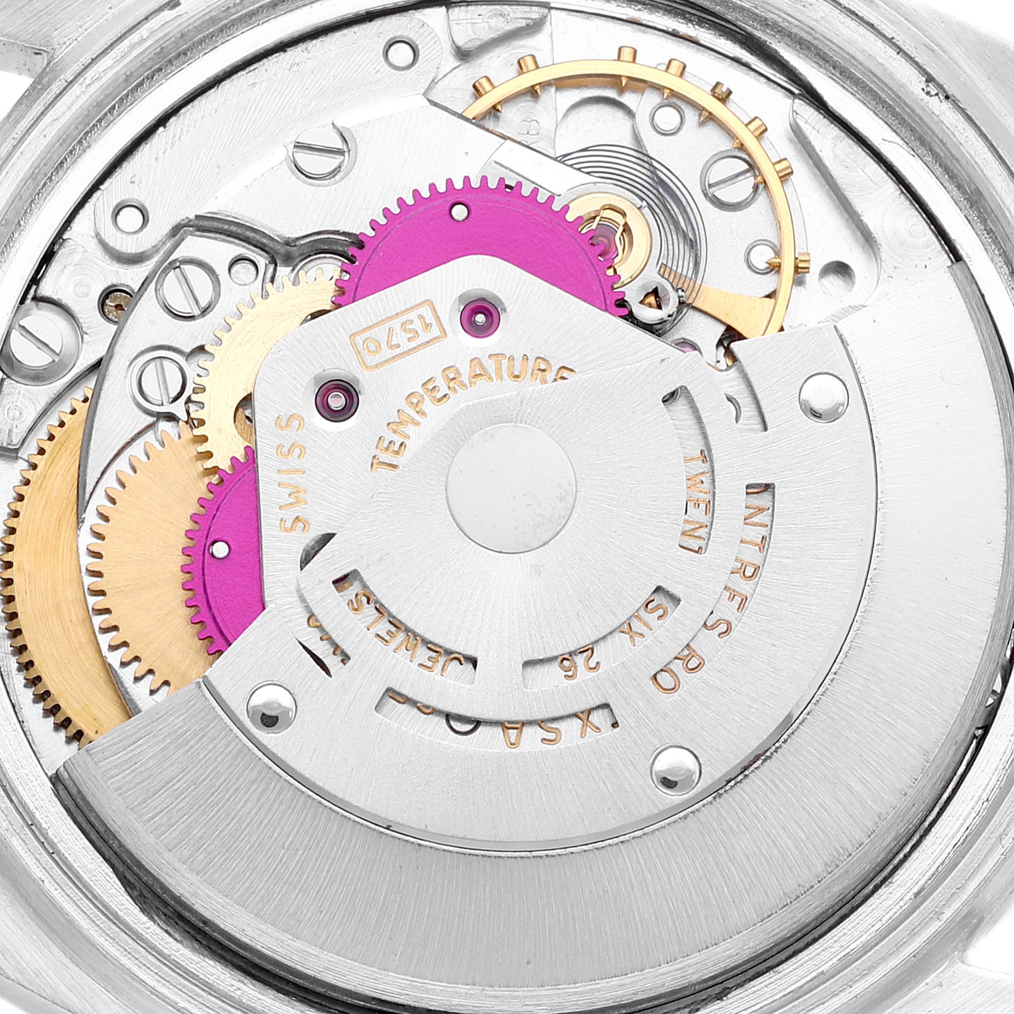 This image shows the internal mechanical movement of a Rolex Datejust 1601 Men
s Steel and Gold (two tone) Champagne Dial 1601 Men
s Steel and Gold (two tone) Champagne Dial watch, featuring intricate gears and components.