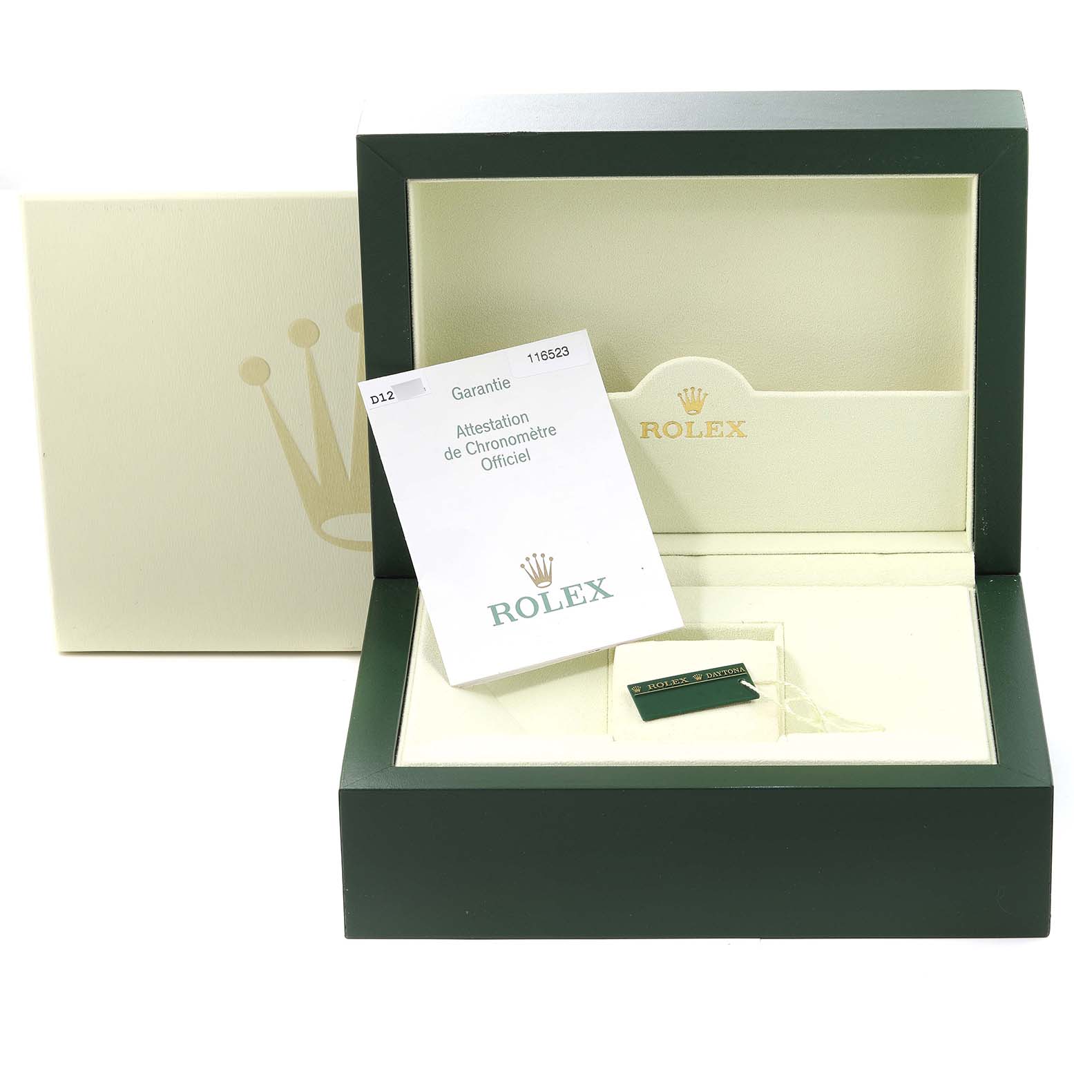 The image shows the packaging for a Rolex Daytona 116523 Men
s Steel and Gold (two tone) Black Dial 116523 Men
s Steel and Gold (two tone) Black Dial, including the box, warranty booklet, and hang tag.