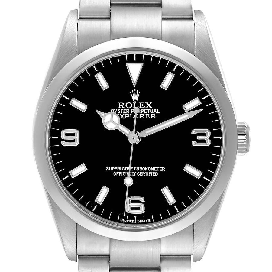 The Rolex Explorer model 114270 is shown from the front, highlighting the black dial, silver hands, markers, and the stainless steel bracelet.