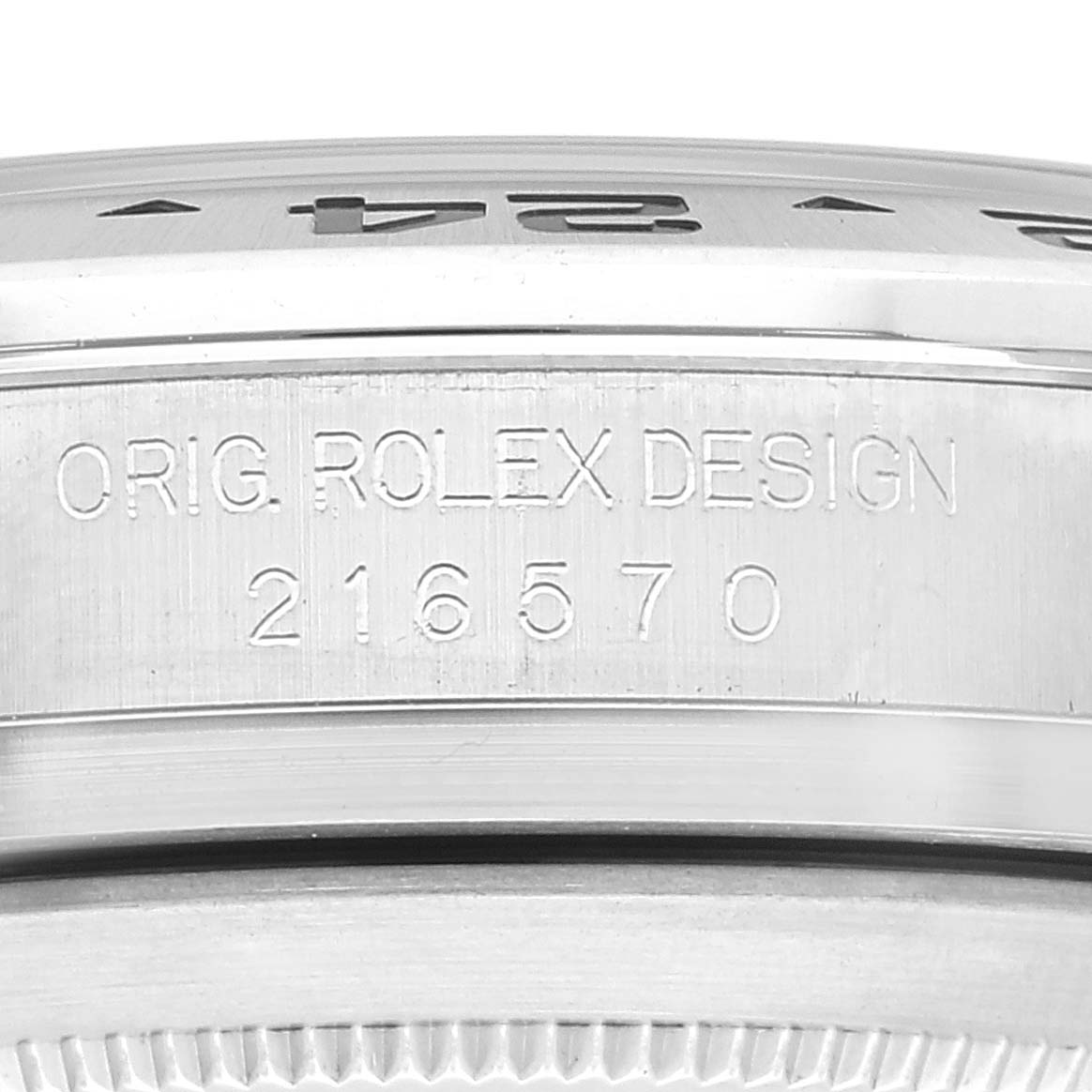 This image shows a close-up of the side of a Rolex Explorer 216570 Men
s Stainless Steel White Dial 216570 Men
s Stainless Steel White Dial watch, including the engraved design number 216570.