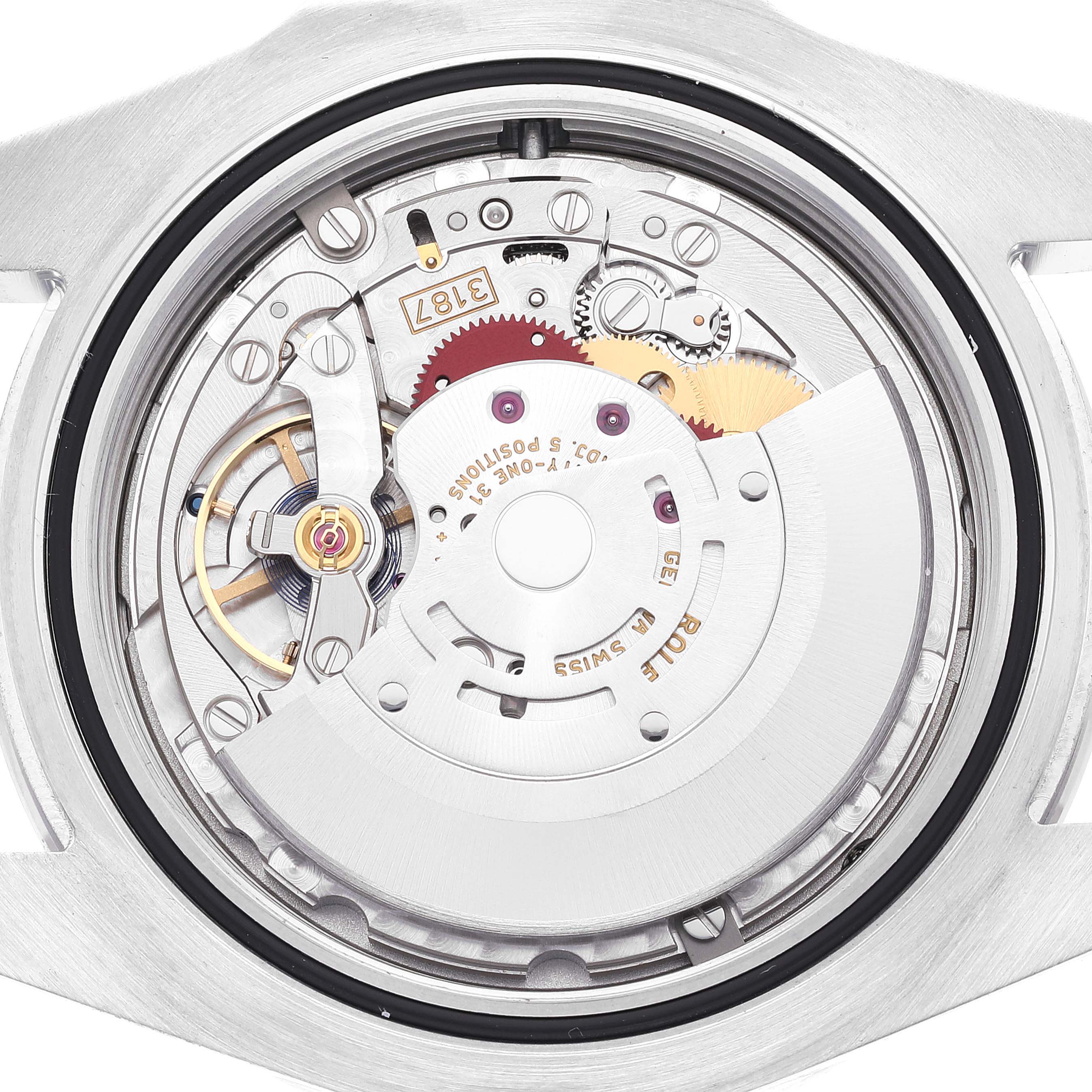 The image shows an internal view of the Rolex Explorer 216570 Men
s Stainless Steel White Dial 216570 Men
s Stainless Steel White Dial watch, highlighting its intricate movement and mechanical components.