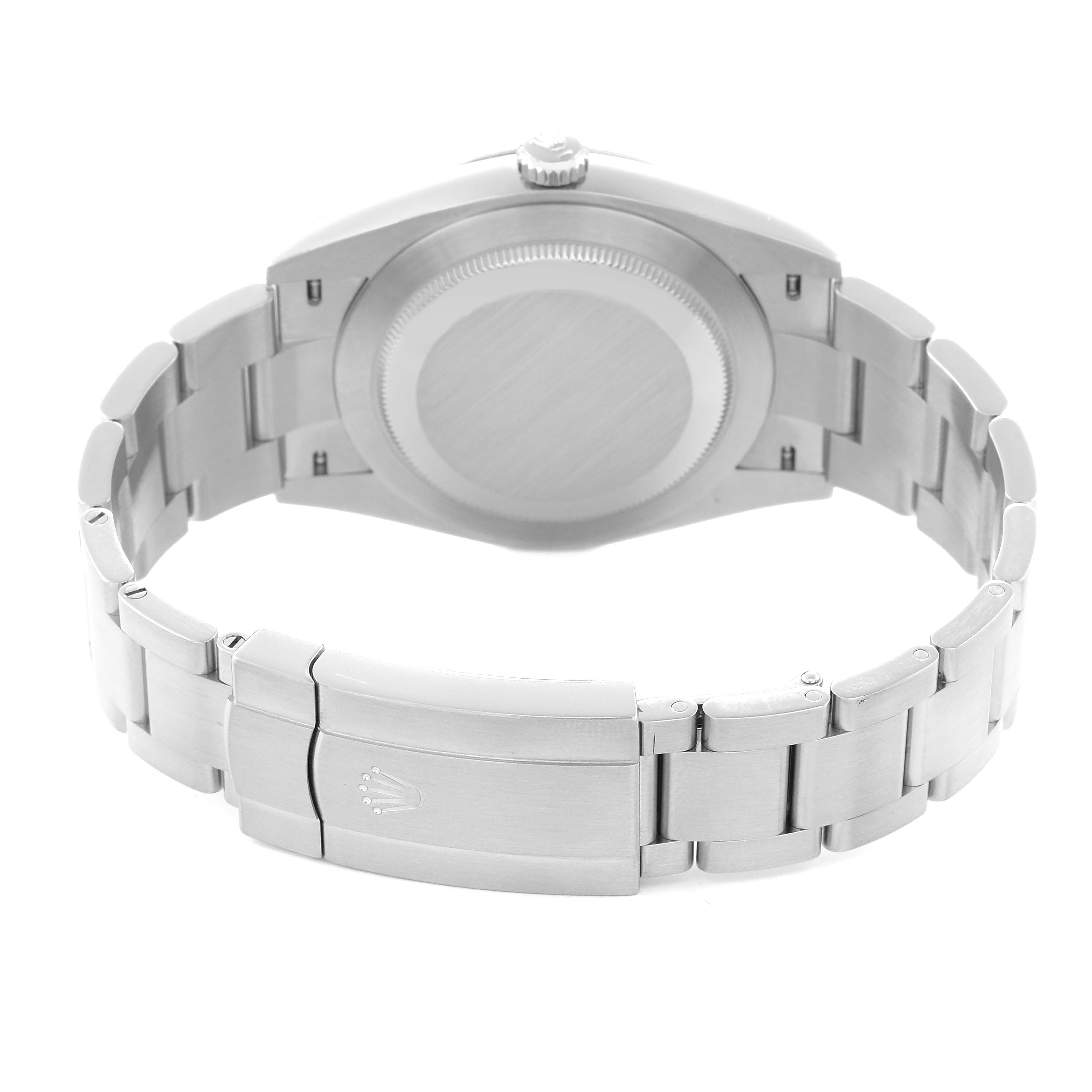 The image shows the back and clasp of the Rolex Oyster Perpetual model 124300 men
s watch, highlighting the case, bracelet, and clasp.