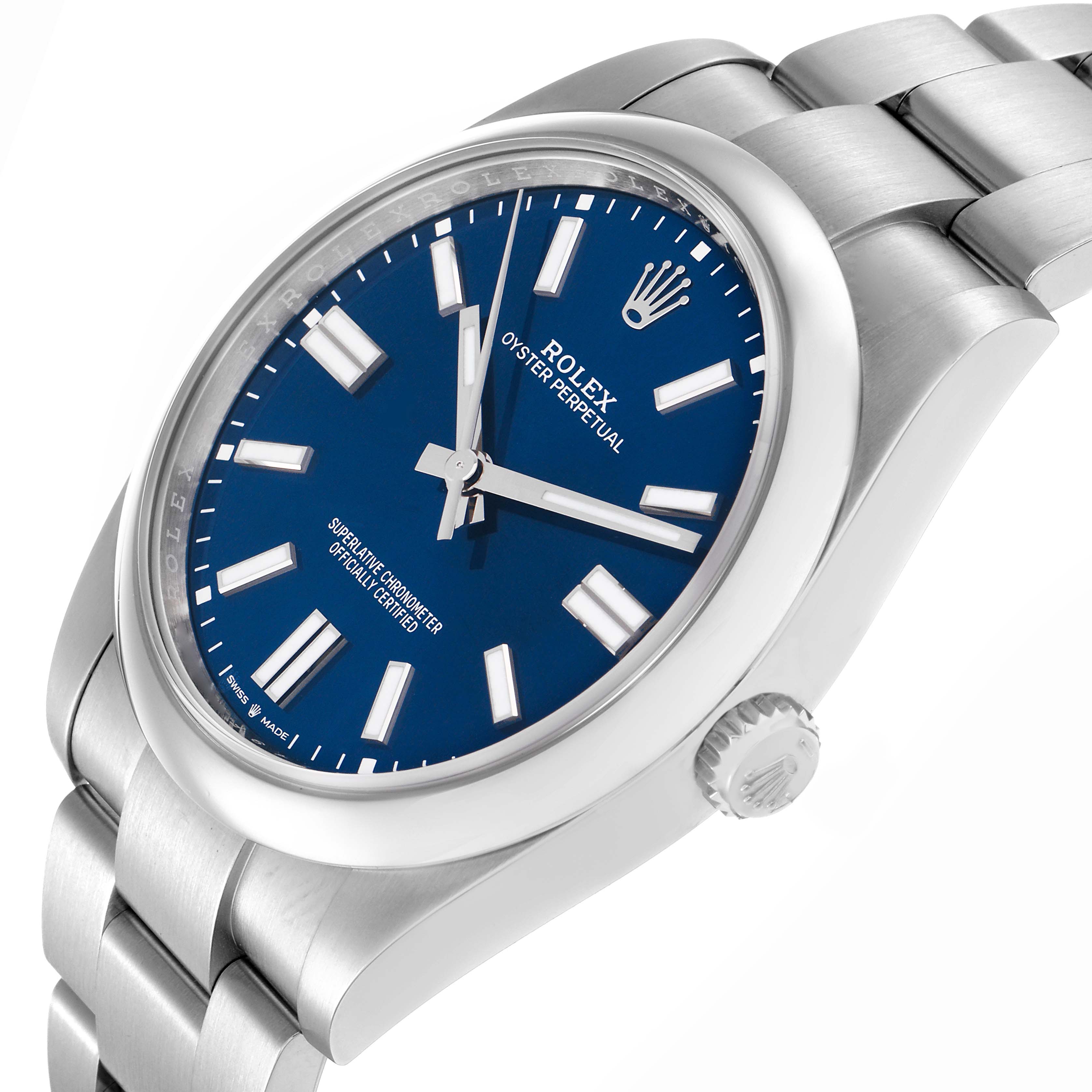 The image shows a Rolex Oyster Perpetual model 124300 men
s watch at a slight side angle, highlighting its blue dial, markers, crown, and part of the bracelet.