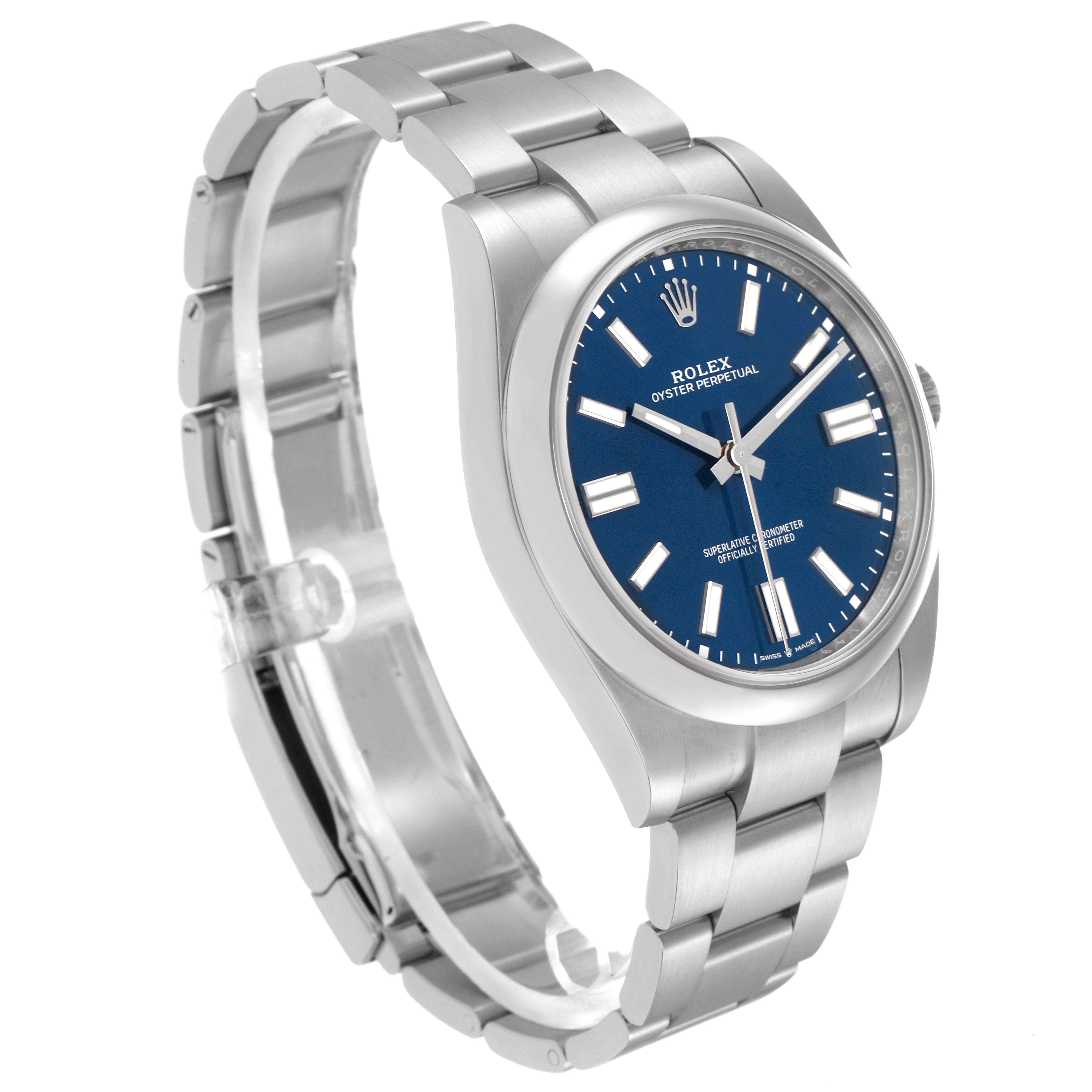 The image shows a Rolex Oyster Perpetual model 124300 men
s watch at a three-quarter angle, focusing on the blue dial, hour markers, and stainless steel bracelet.