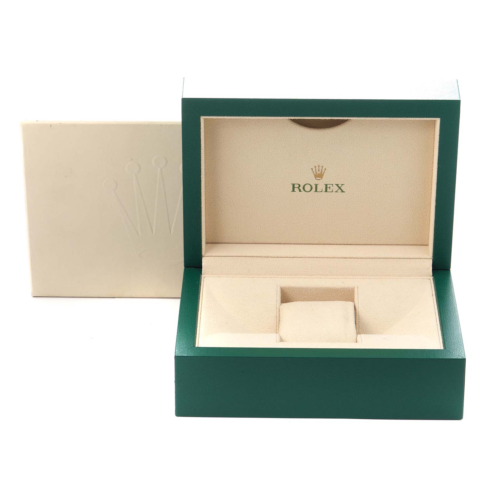 The image shows the open box for a Rolex Oyster Perpetual model number 124300, revealing the watch
s storage compartment and embossed brand logo inside.