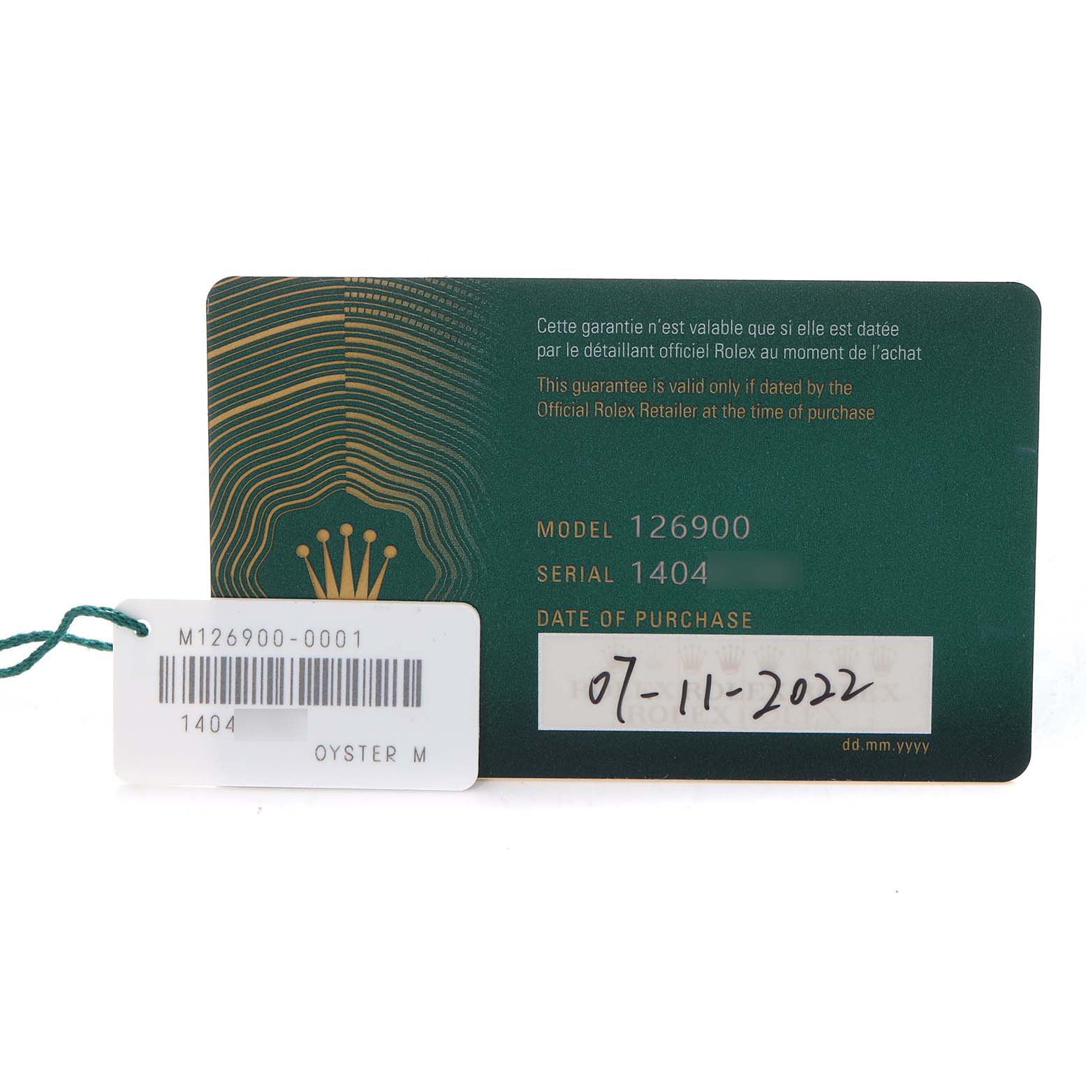 The image shows a warranty card and tag for a Rolex Air-King, model number 126900, with purchase details included.