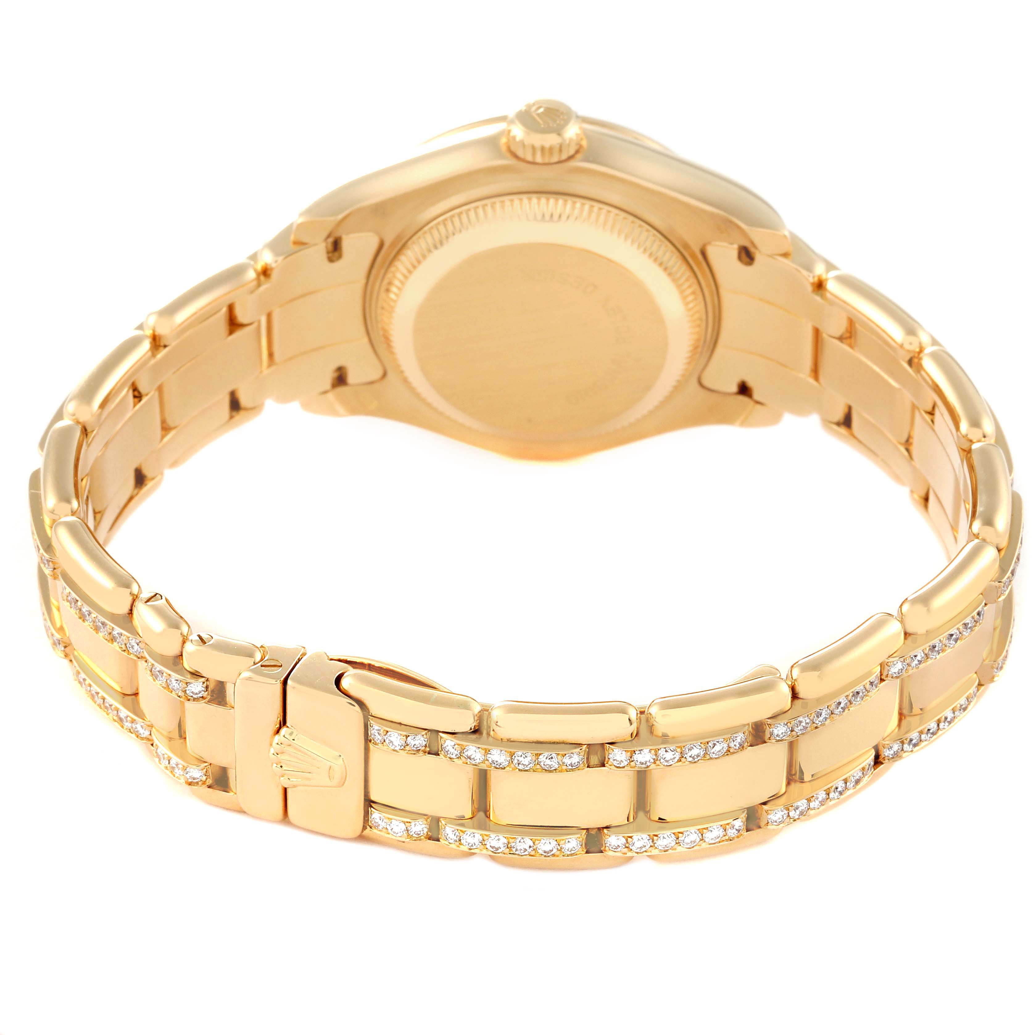 The image shows the back and bracelet of the Rolex Pearlmaster 69298 Women's Yellow Gold Mother of Pearl Dial 69298 Women's Yellow Gold Mother of Pearl Dial watch, highlighting the gold case and diamond-set links.