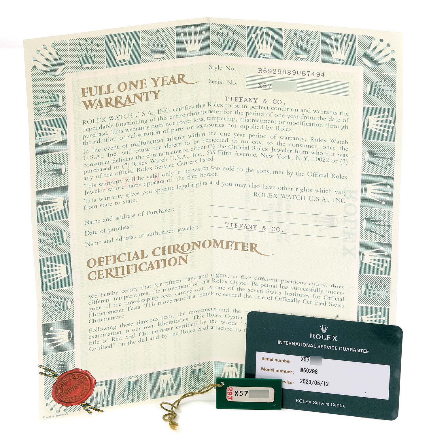 The image shows the warranty and chronometer certification paperwork for a Rolex Pearlmaster 69298 Women's Yellow Gold Mother of Pearl Dial 69298 Women's Yellow Gold Mother of Pearl Dial model along with a service tag and guarantee card.