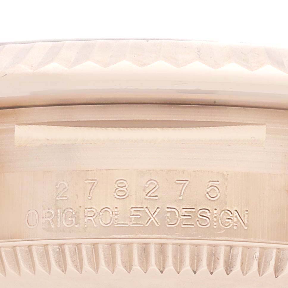The image shows a close-up of the Rolex President 278275 Women's Rose Gold Brown Dial 278275 Women's Rose Gold Brown Dial model text and serial number on the watch's case side.