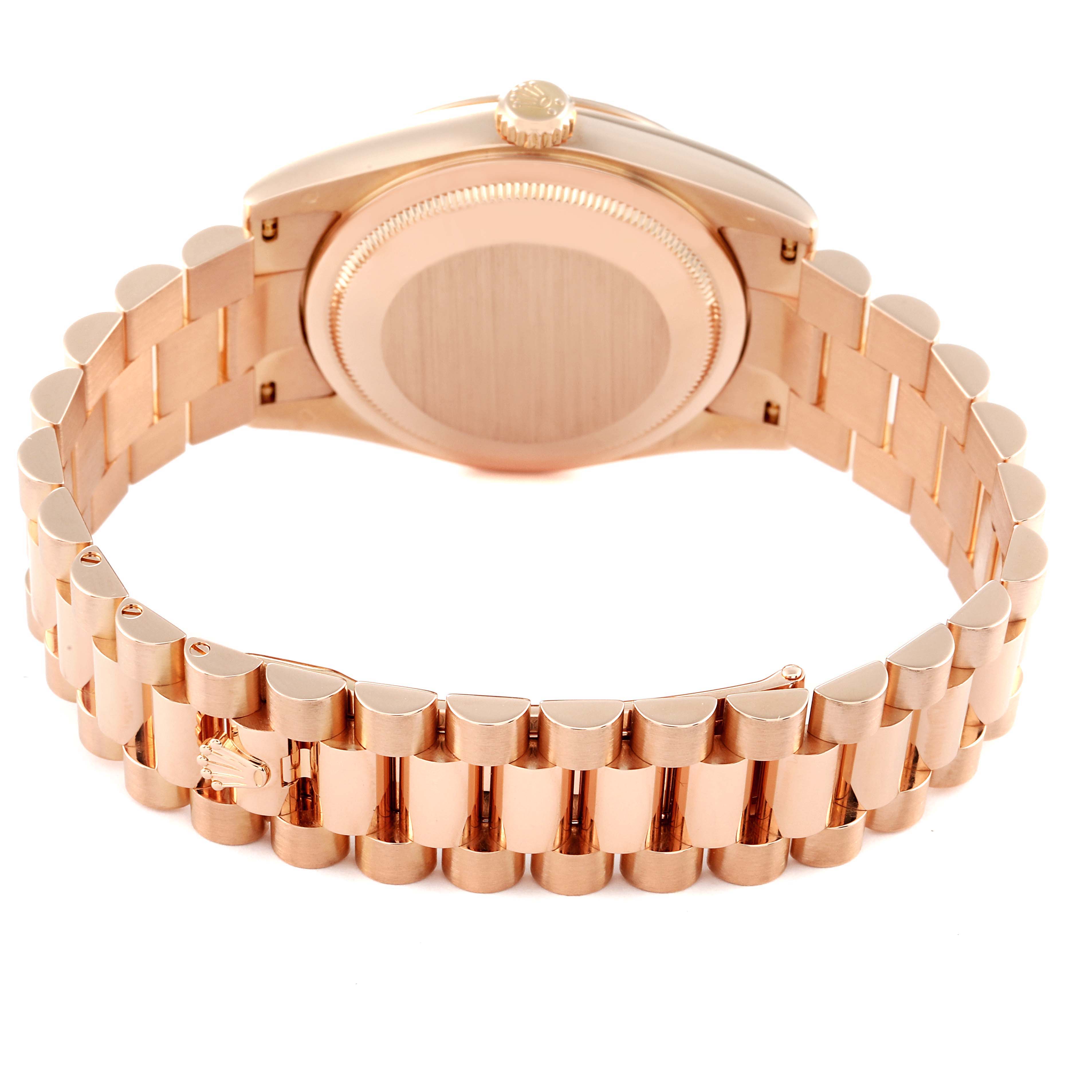 The image shows the backside and bracelet of a Rolex President 118235 Men's Rose Gold Pink Dial 118235 Men's Rose Gold Pink Dial model watch, focusing on the clasp and back case.