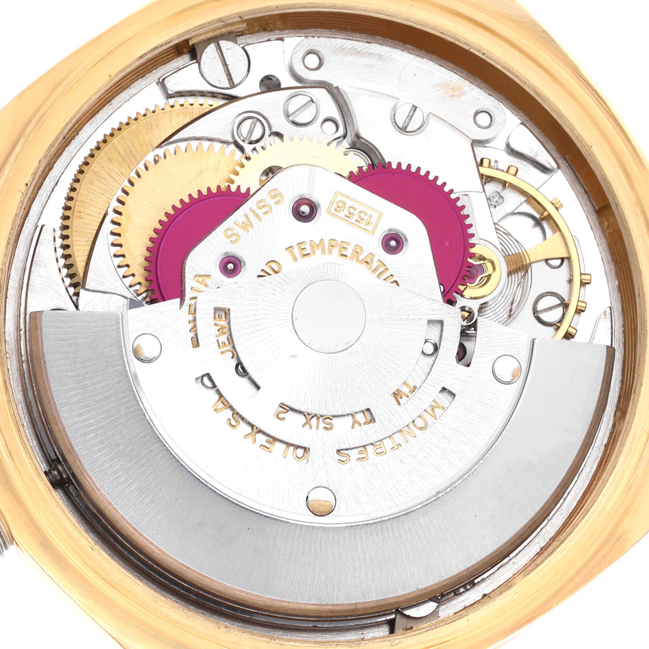 The image shows the intricate internal movement of the Rolex Vintage Collection 1803 Men's Yellow Gold Champagne Dial 1803 Men's Yellow Gold Champagne Dial watch viewed from the back.