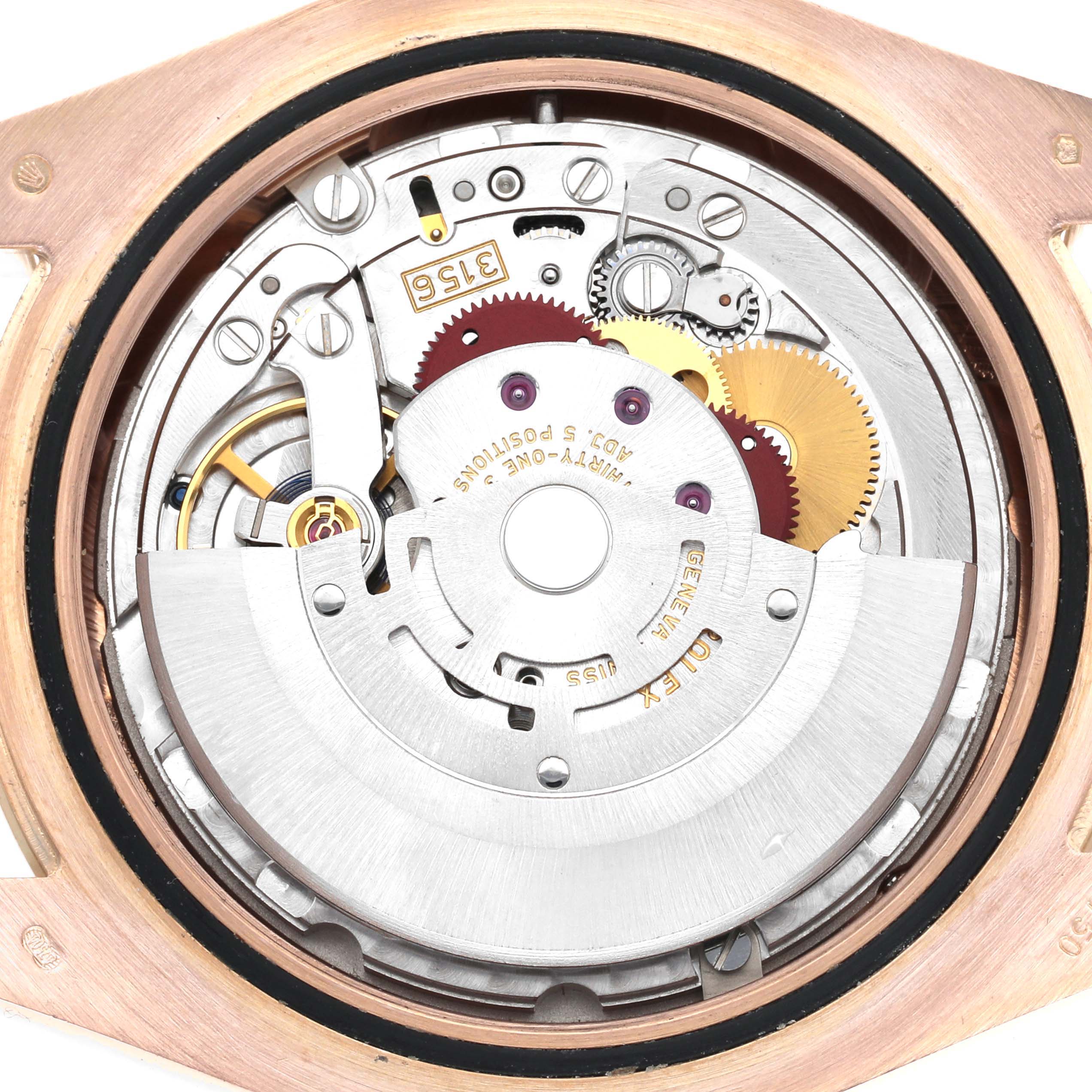 The image shows the internal movement of a Rolex President model, model number 218235, viewed from the back, revealing gears and mechanical components.