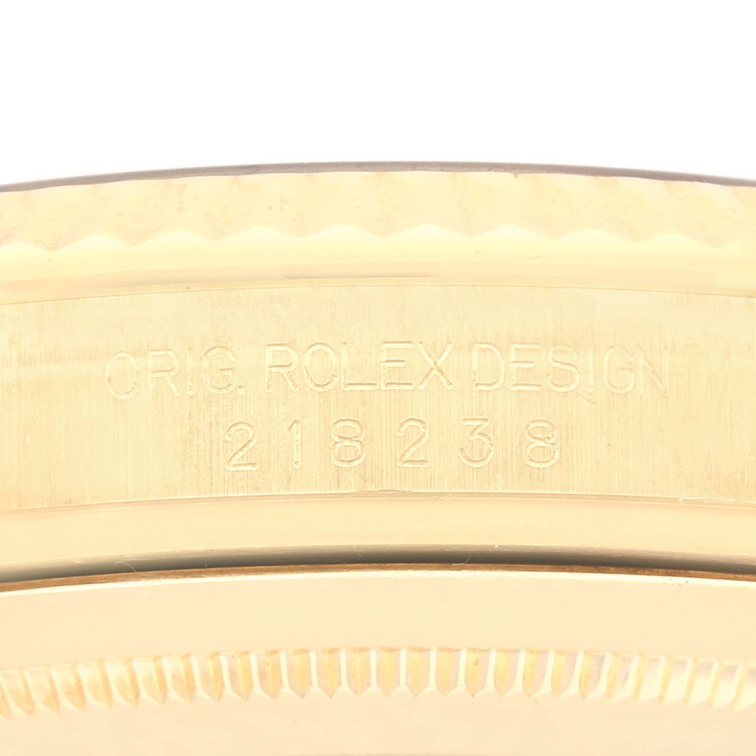 The image shows the side of a Rolex President model 218238, highlighting the model number and design engraving on the watch case.