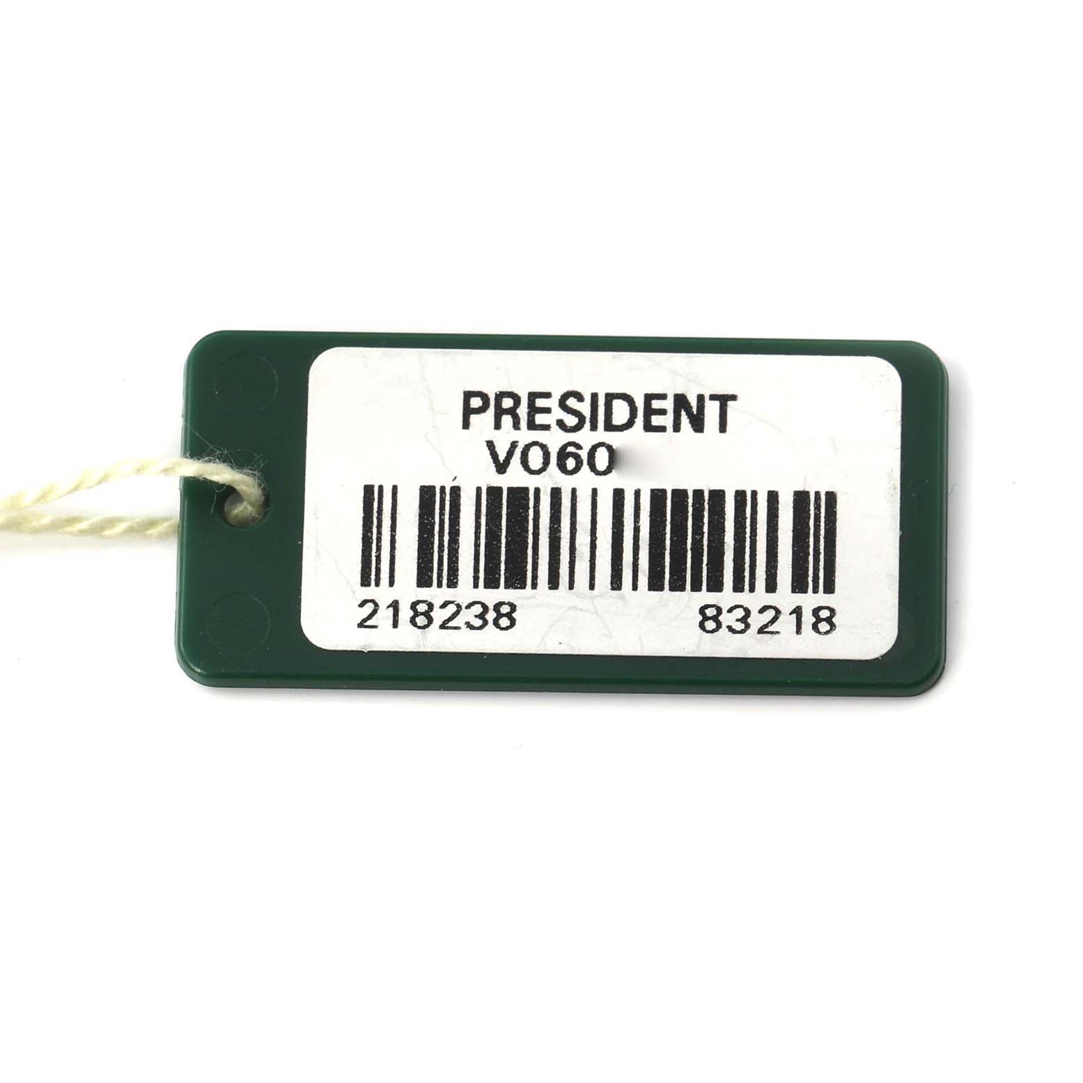 The image shows a tag for the Rolex President model, model number 218238, featuring a barcode and text on a rectangular green tag.