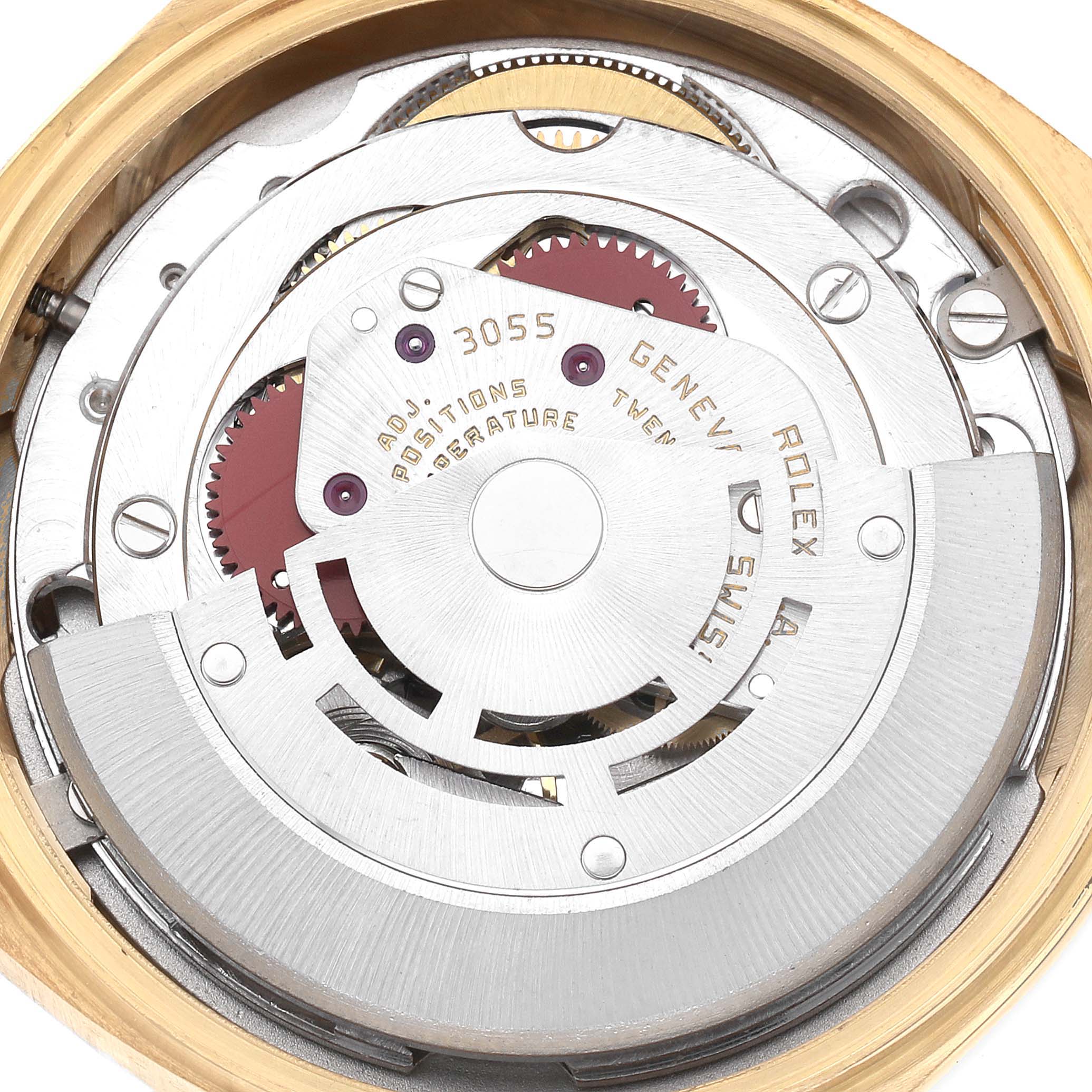 The image shows a close-up view of the Rolex President 18038 Men's Yellow Gold Champagne Dial model watch movement, highlighting gears and inner workings.