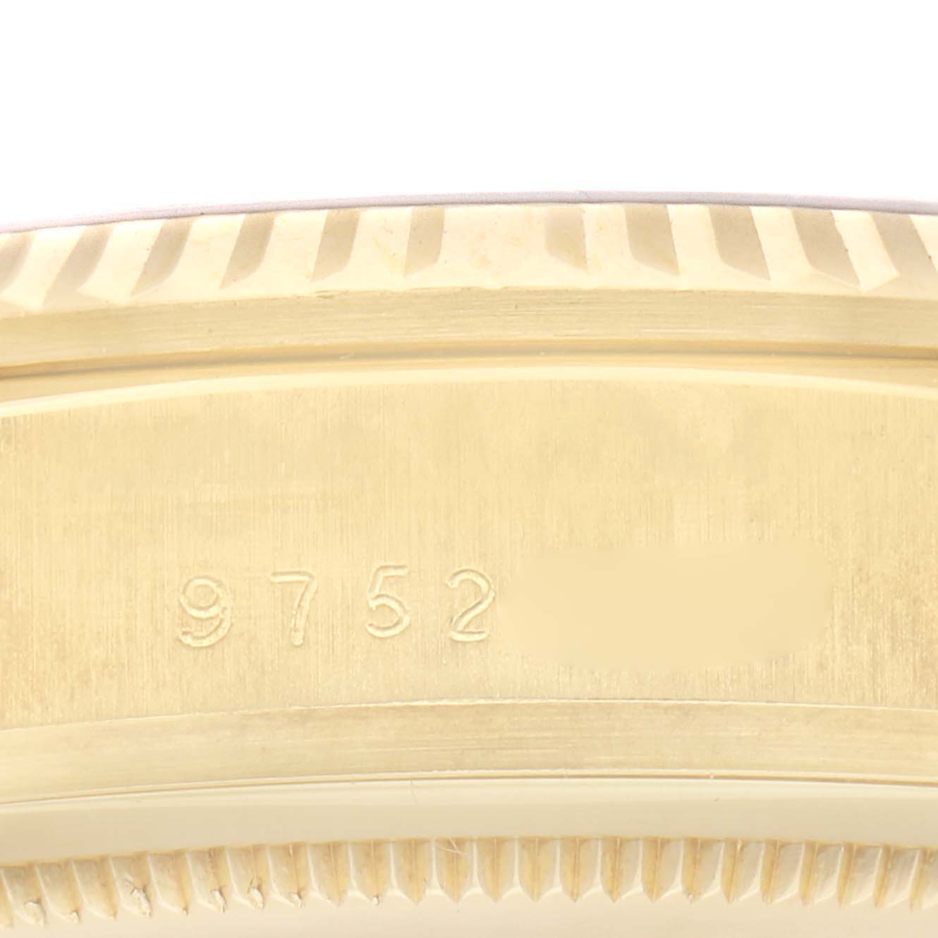 The image shows a close-up of the case
s underside of a Rolex President model, model number 18038, emphasizing its engraved serial number.