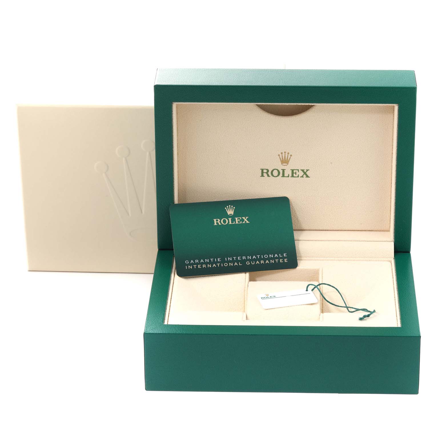 The image shows the packaging box, international guarantee card, and tag of the Rolex Sea-Dweller 126600 Men
s Stainless Steel Black Dial 126600 Men
s Stainless Steel Black Dial model from a front angle.