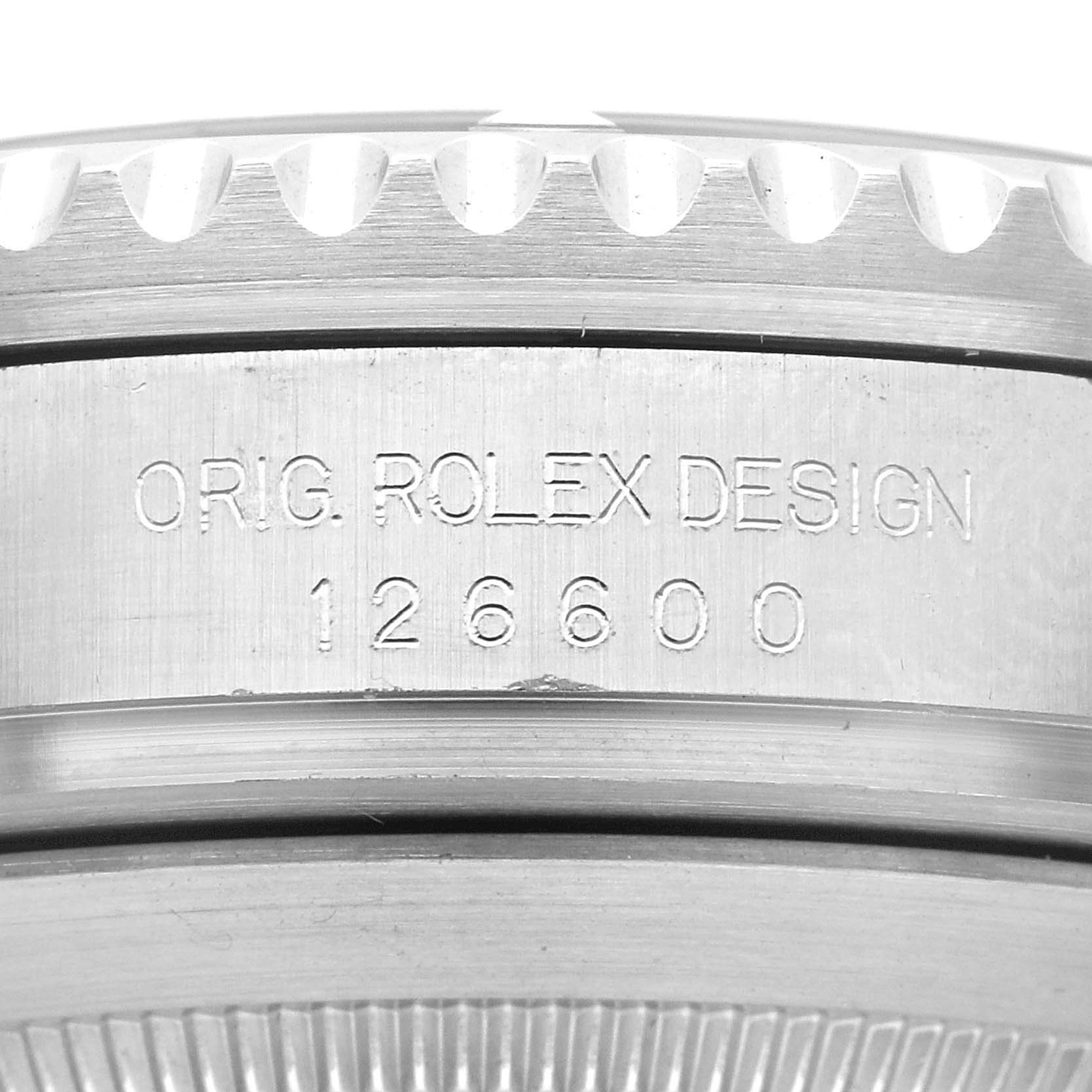 The image shows a close-up of the engraved side view of the Rolex Sea-Dweller 126600 Men
s Stainless Steel Black Dial 126600 Men
s Stainless Steel Black Dial model with the design and model number 126600.