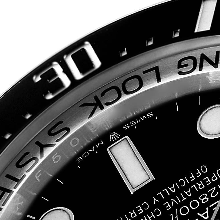 This image shows a close-up angle of the bezel and part of the dial of a Rolex Sea-Dweller 136660 Men
s Stainless Steel Black Dial 136660 Men
s Stainless Steel Black Dial watch.